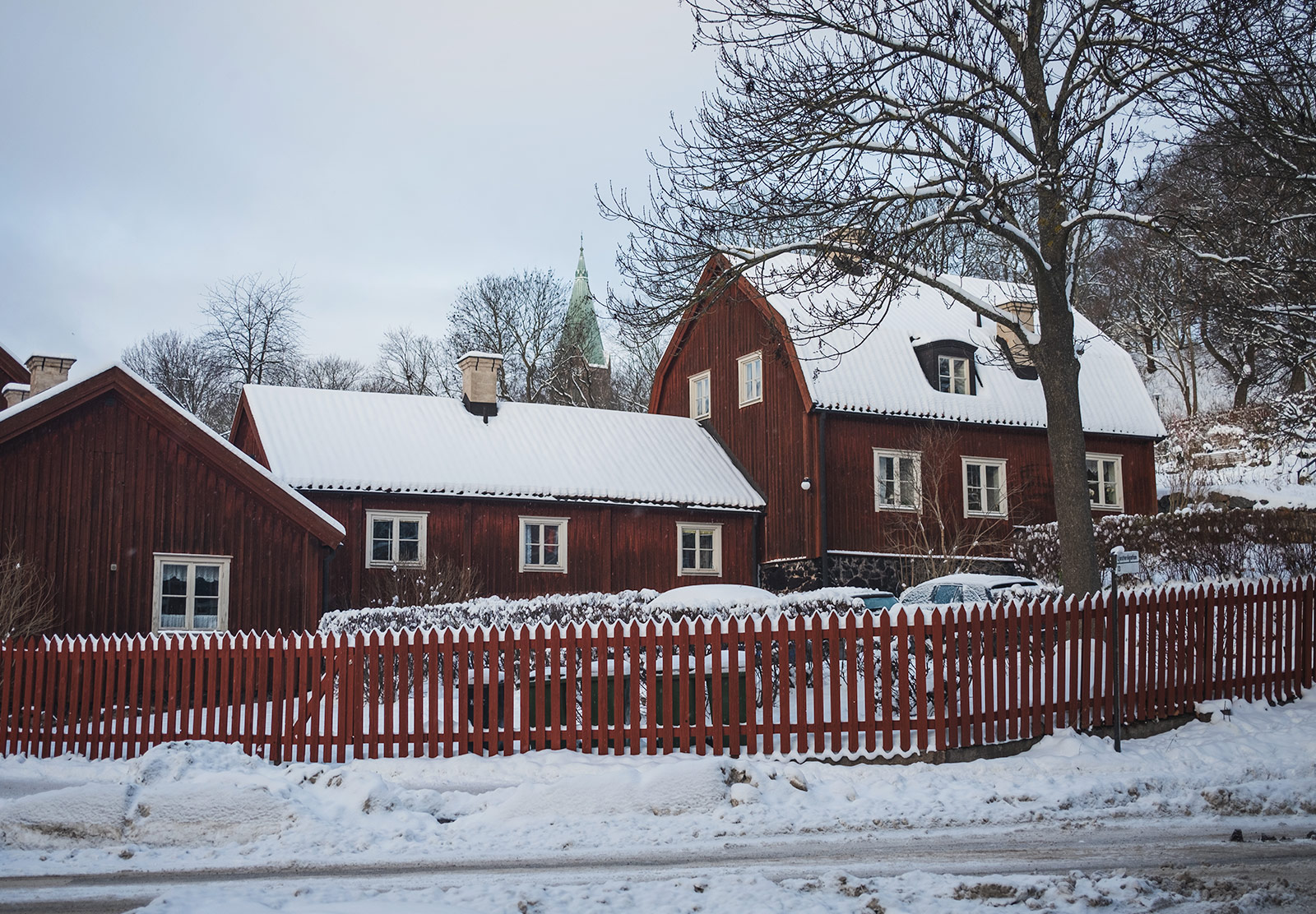 Old wooden houses in the snow