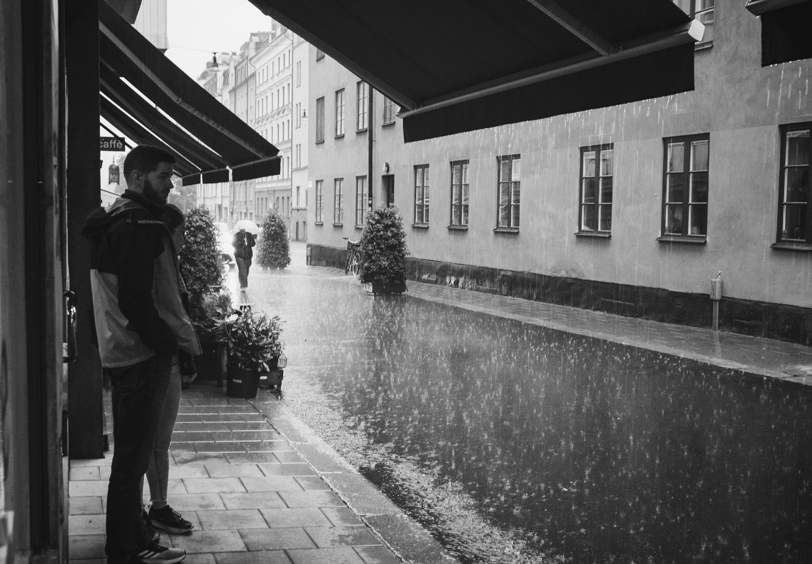 People sheltering from the rain