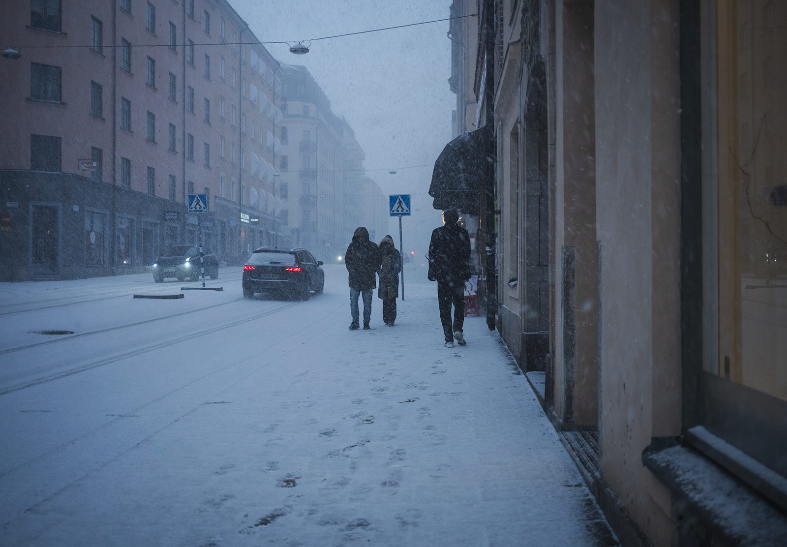 People walking in blizzard