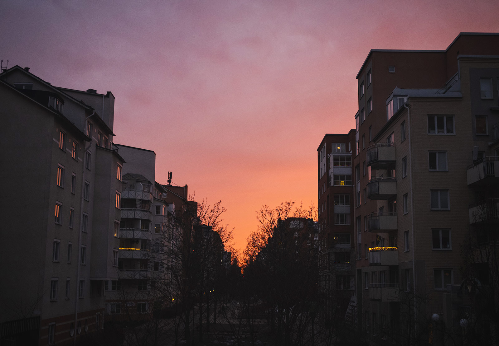 Buildings with colourful sky in the background