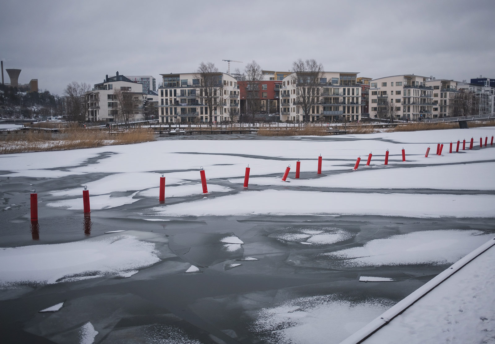 Snow on iced waterway
