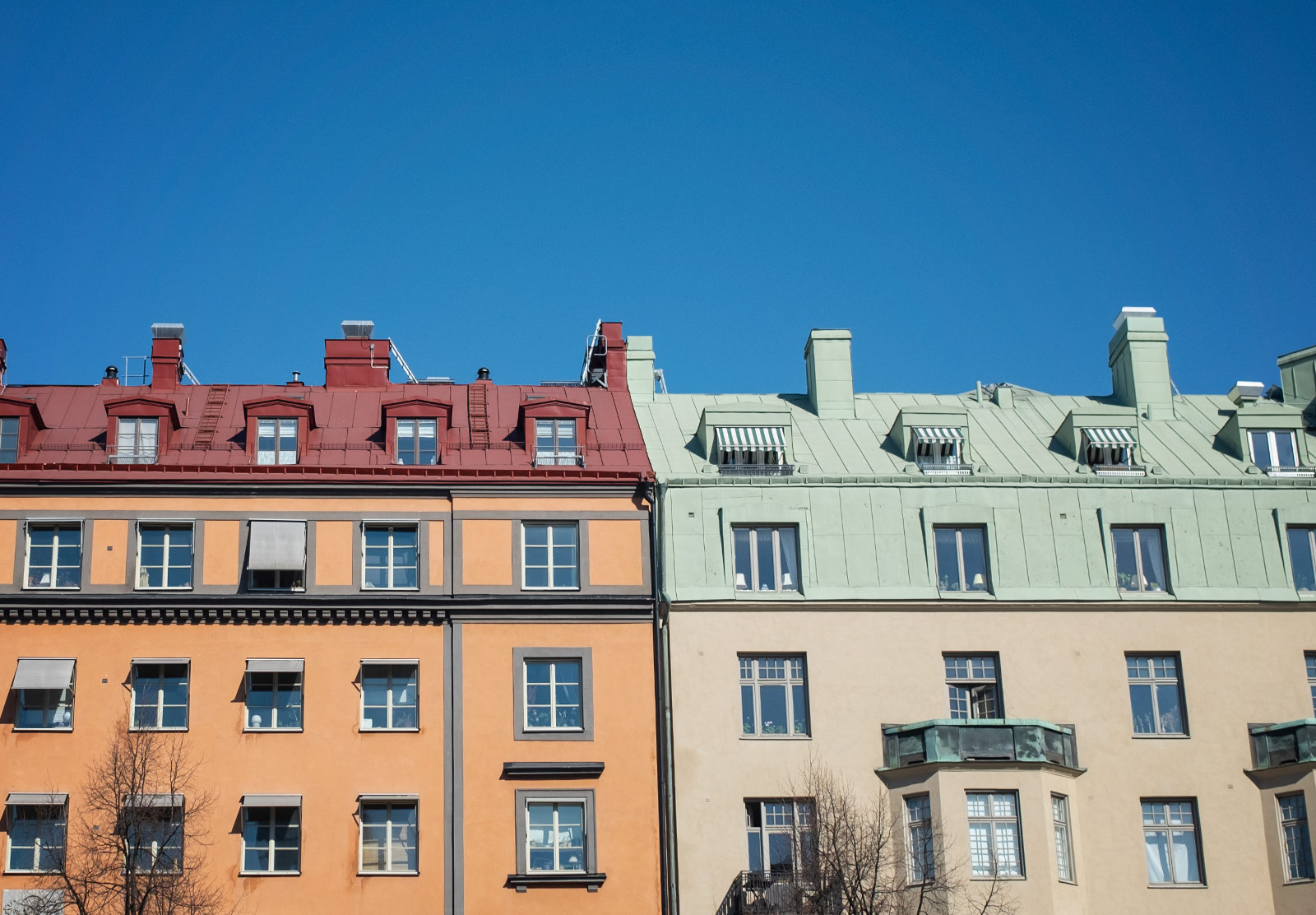 Old buildings against clear skies