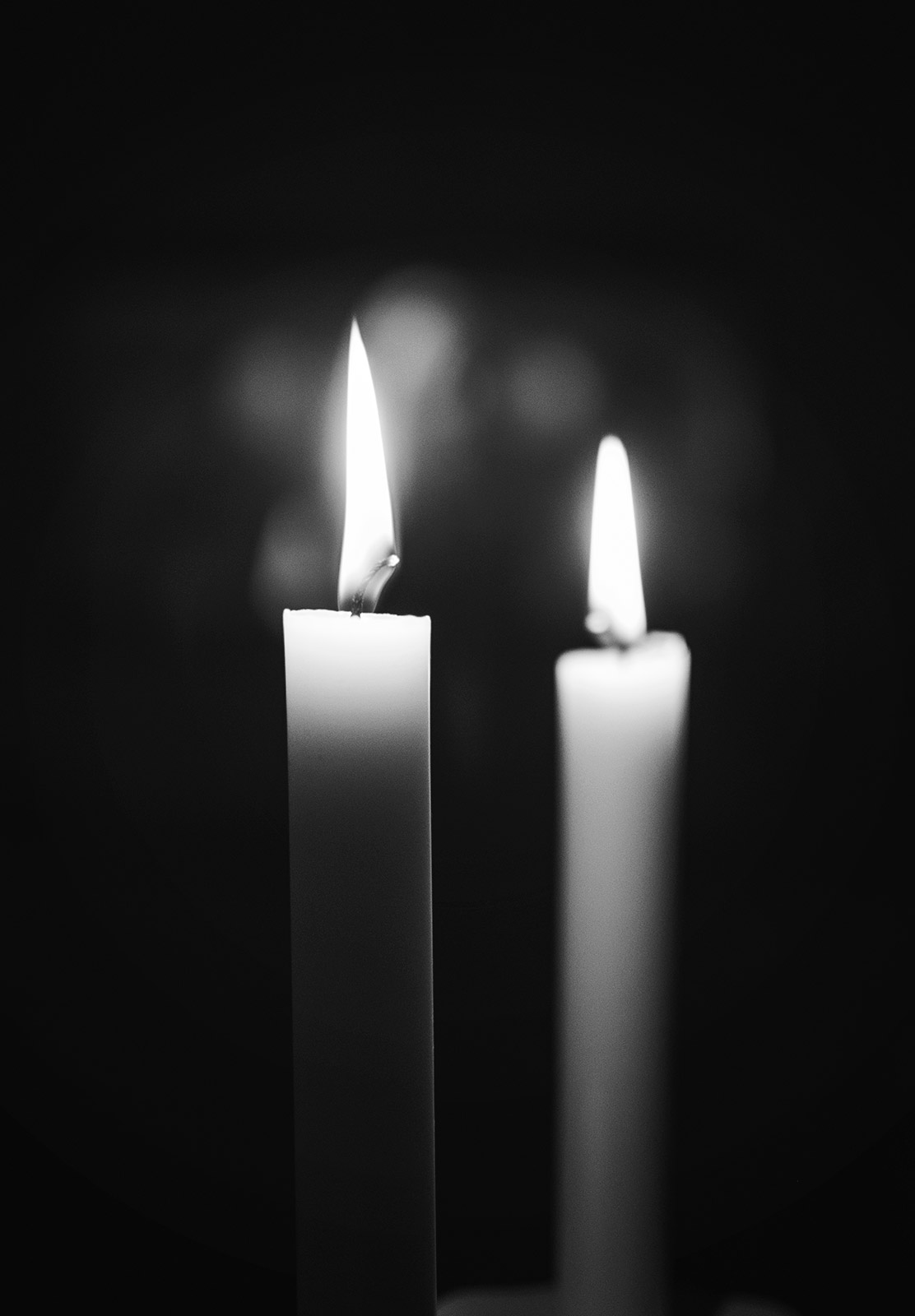 Candle flames in the dark