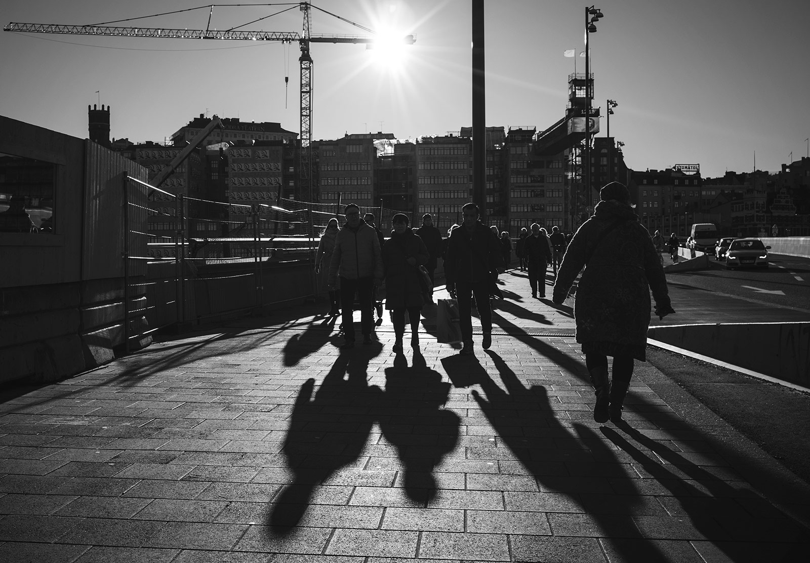 Shadows of people walking