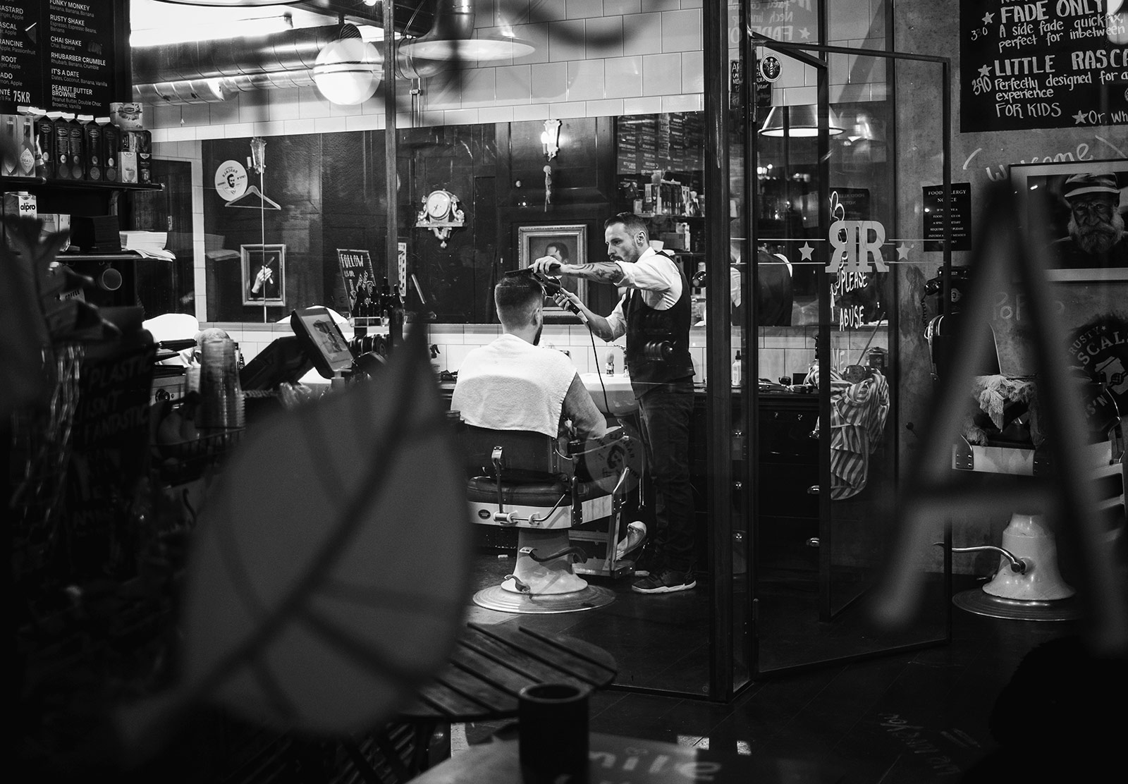 Man sat in barber chair