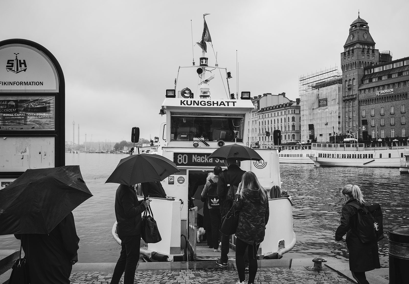 People boarding a boat