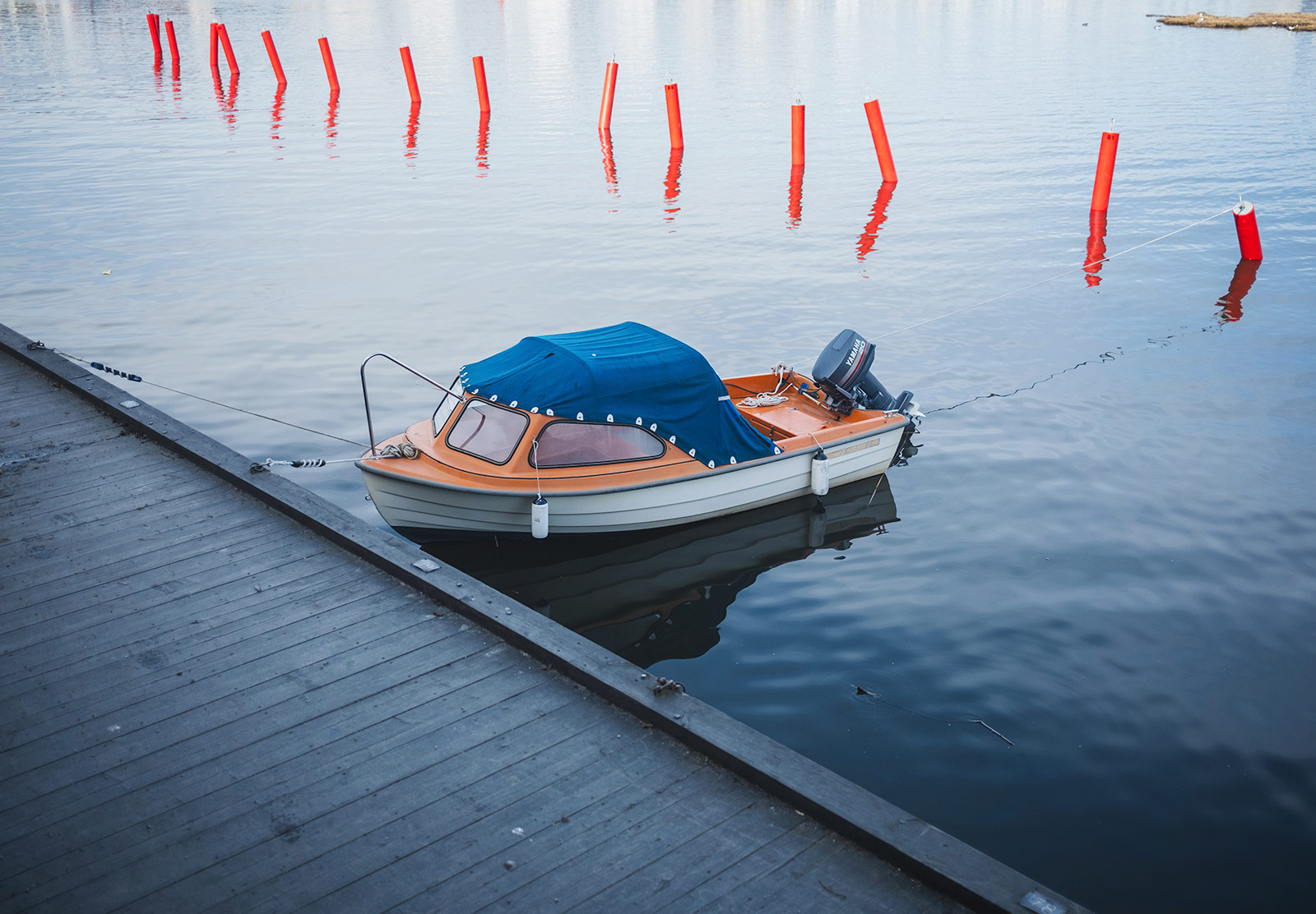 Small boat sitting on the water