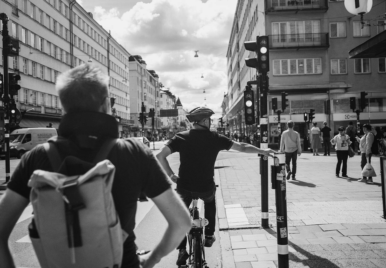Cyclist waiting at traffic light