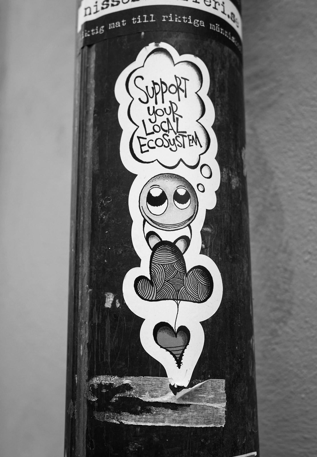 Sticker on lamp post