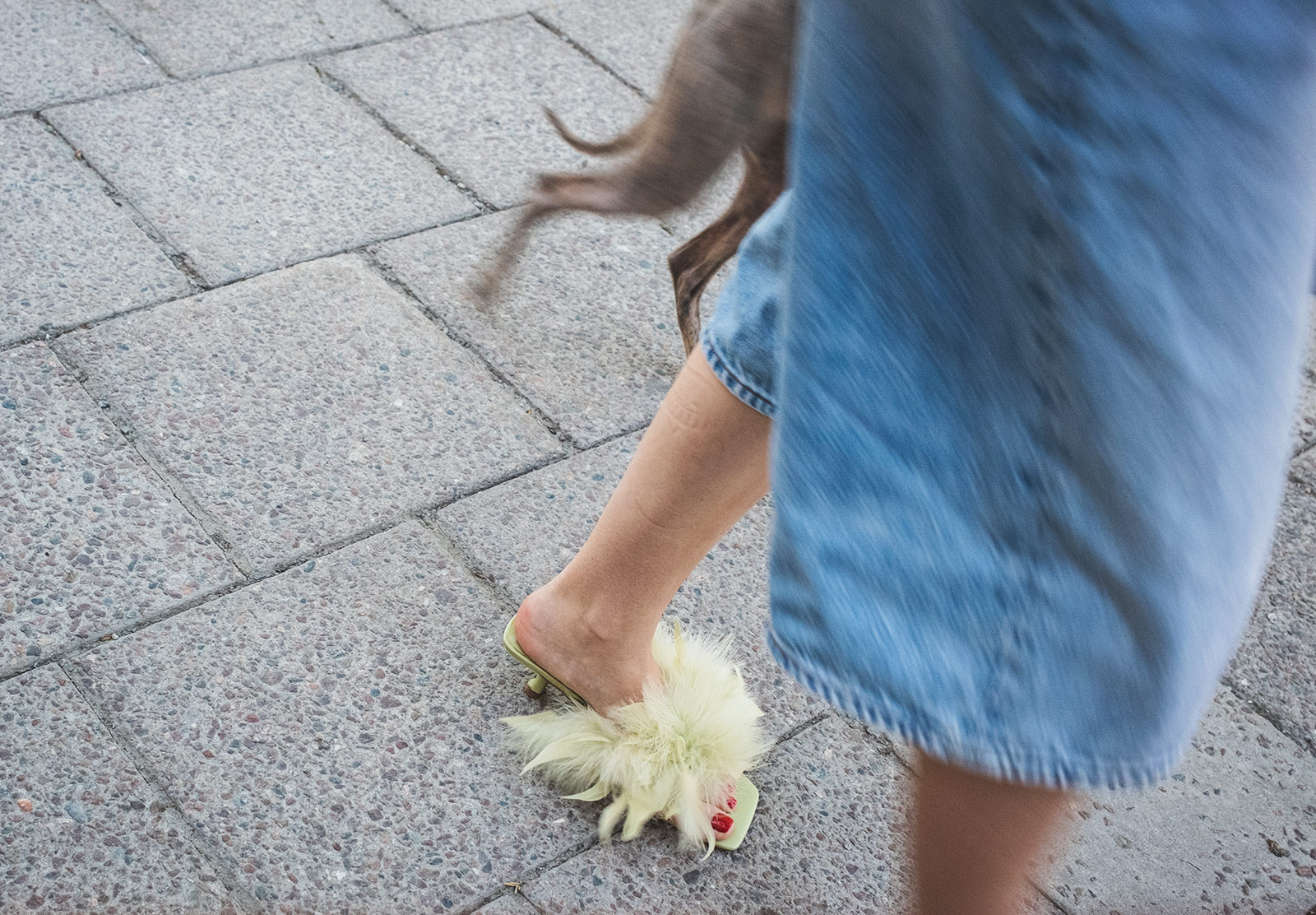 Fluffy shoe on woman's foot