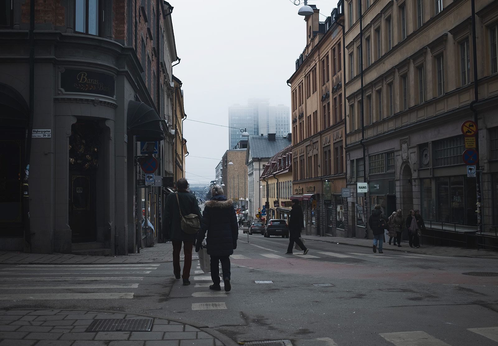 Fog hanging over tall building