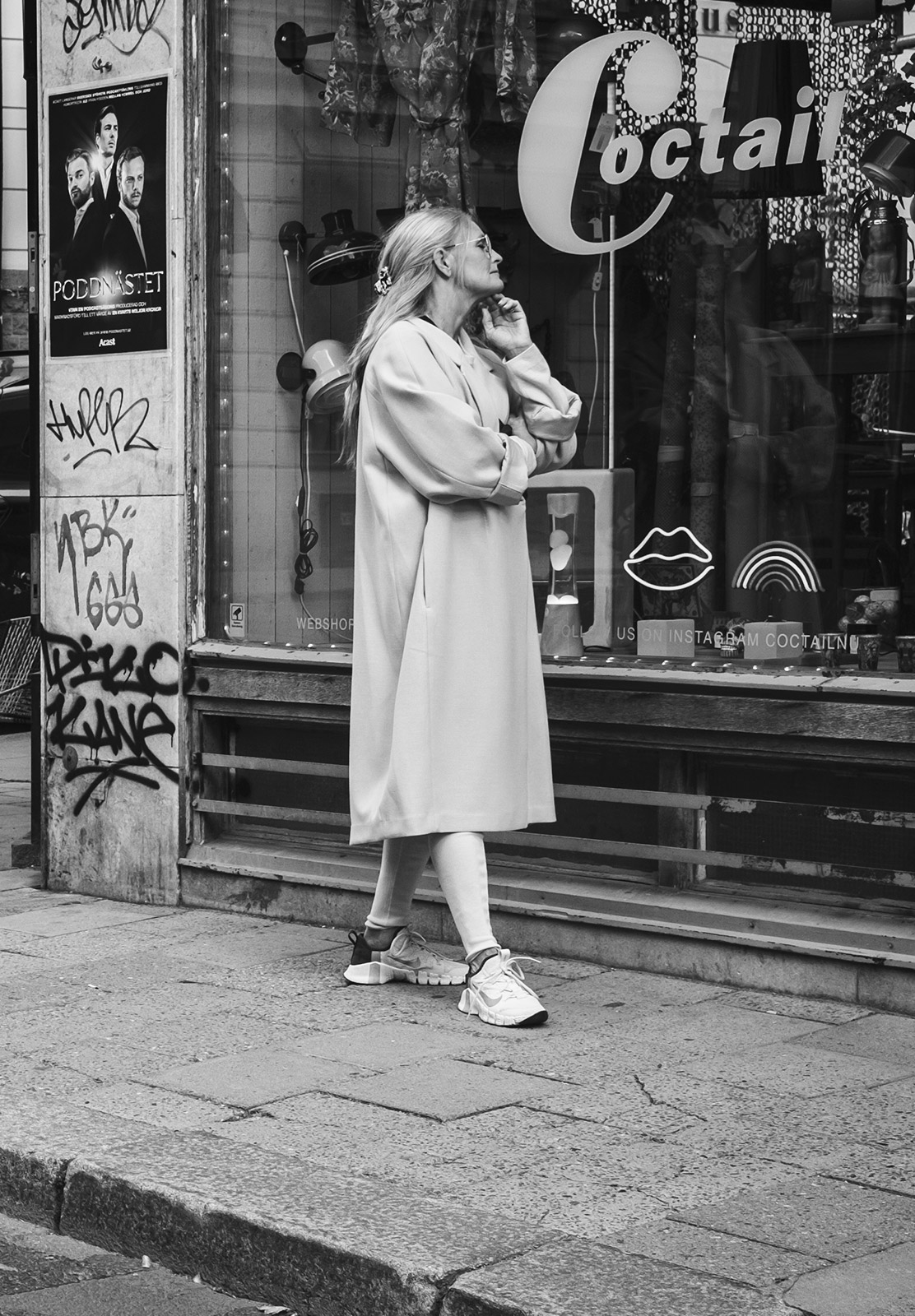 Woman looking in window