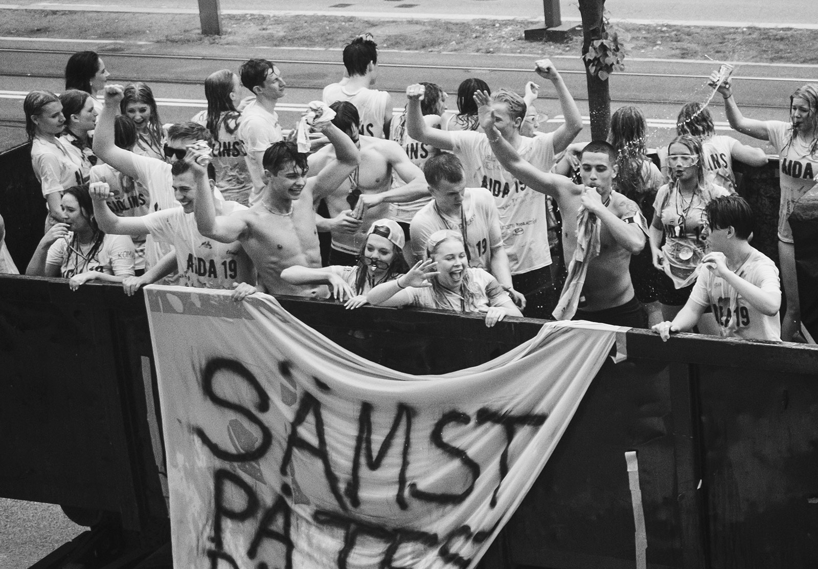 People cheering in truck