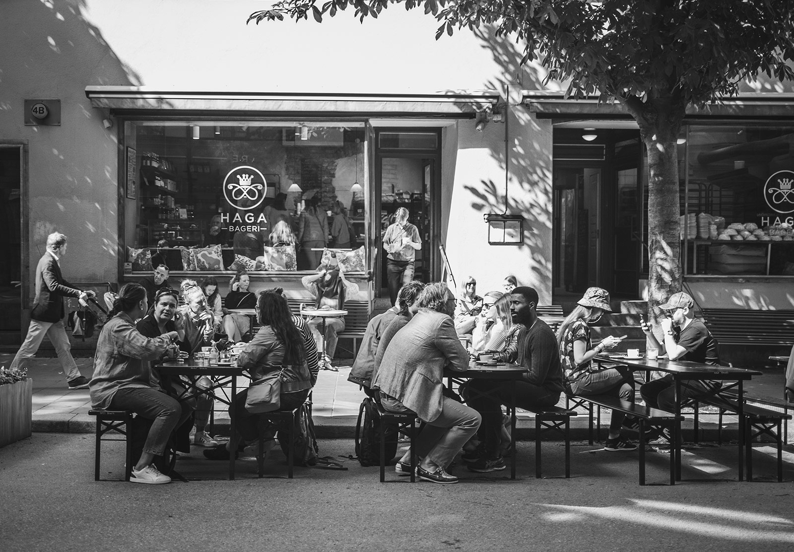 People sat outside a city bakery