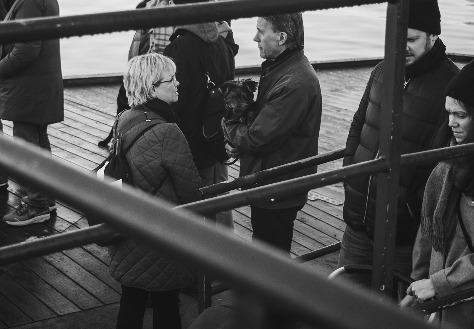 Man holding small dog