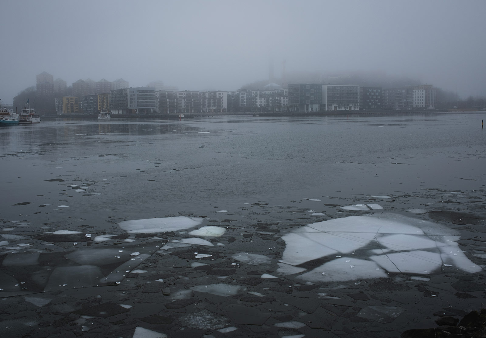 Sheets of ice on water