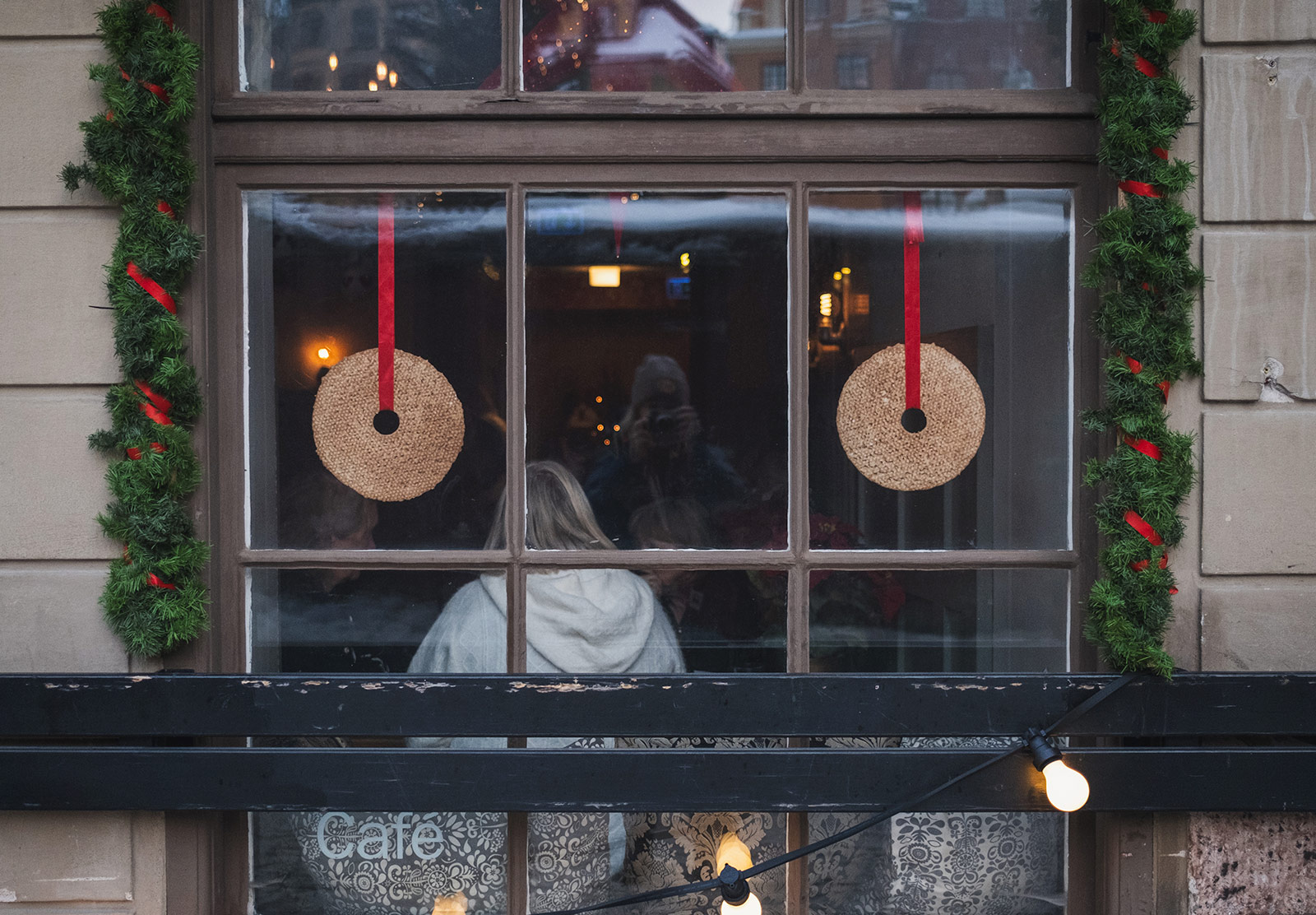 Crisp breads hanging in window on ribbon