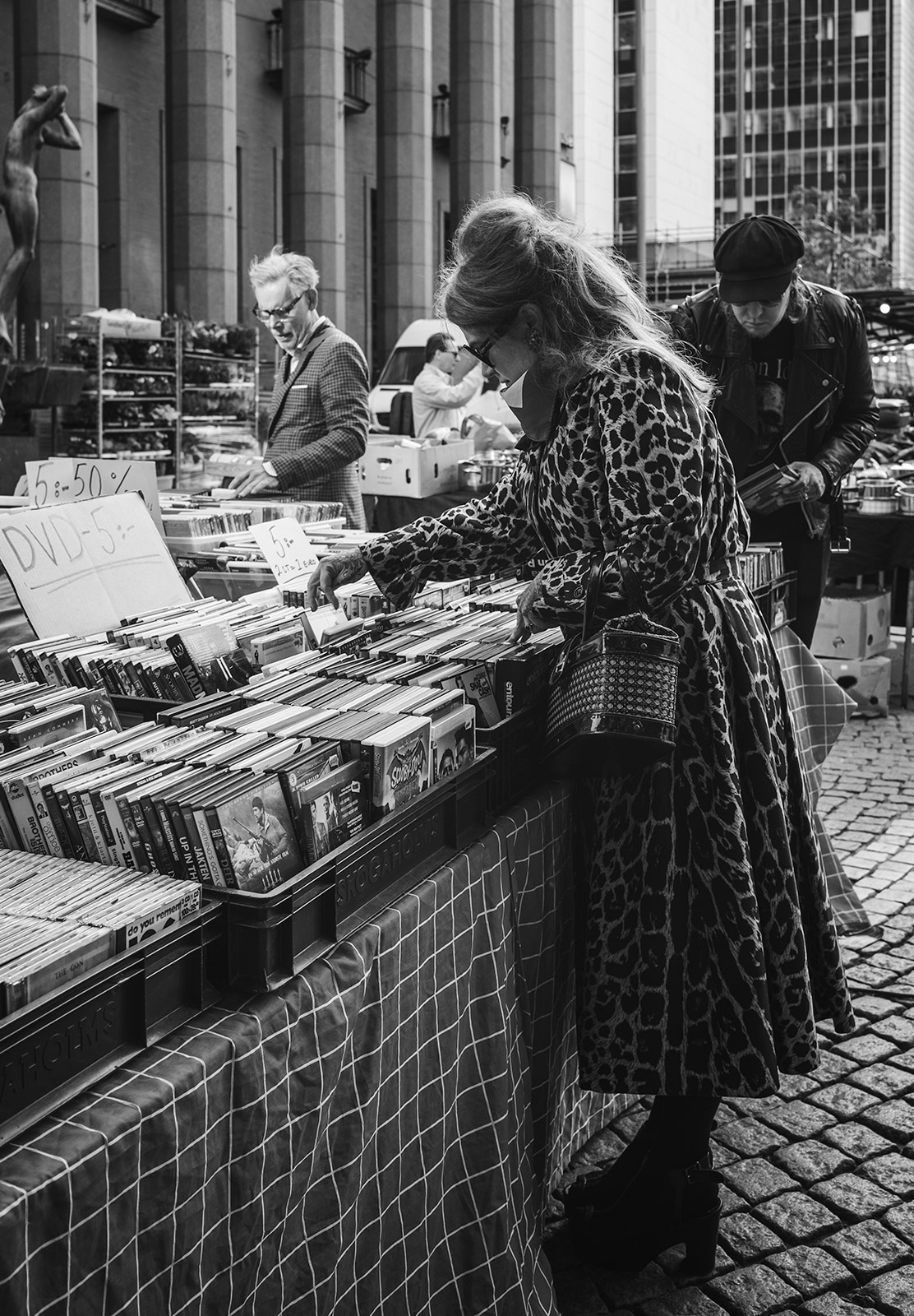 Lady looking at DVDs