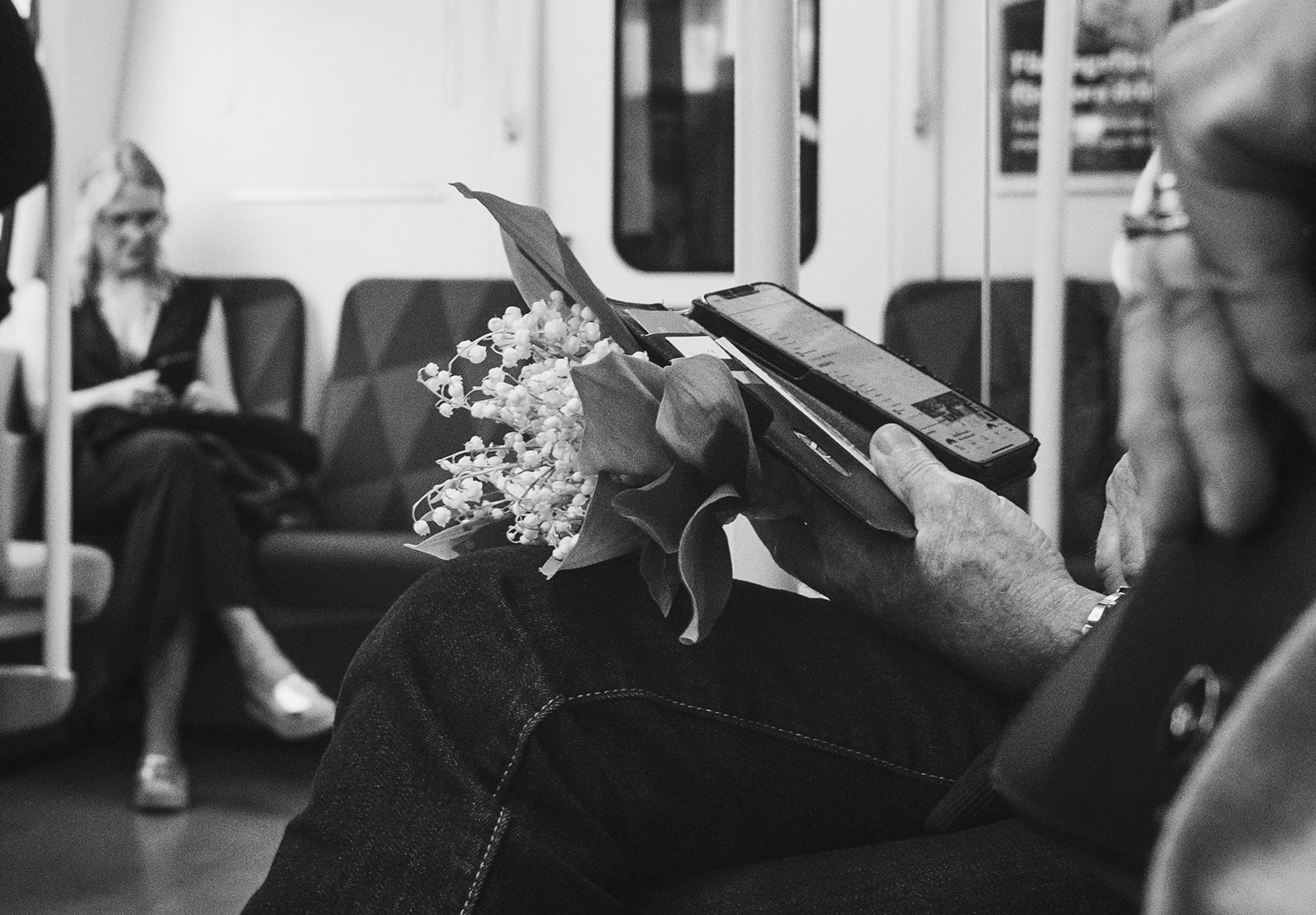 Man holding punch of picked flowers