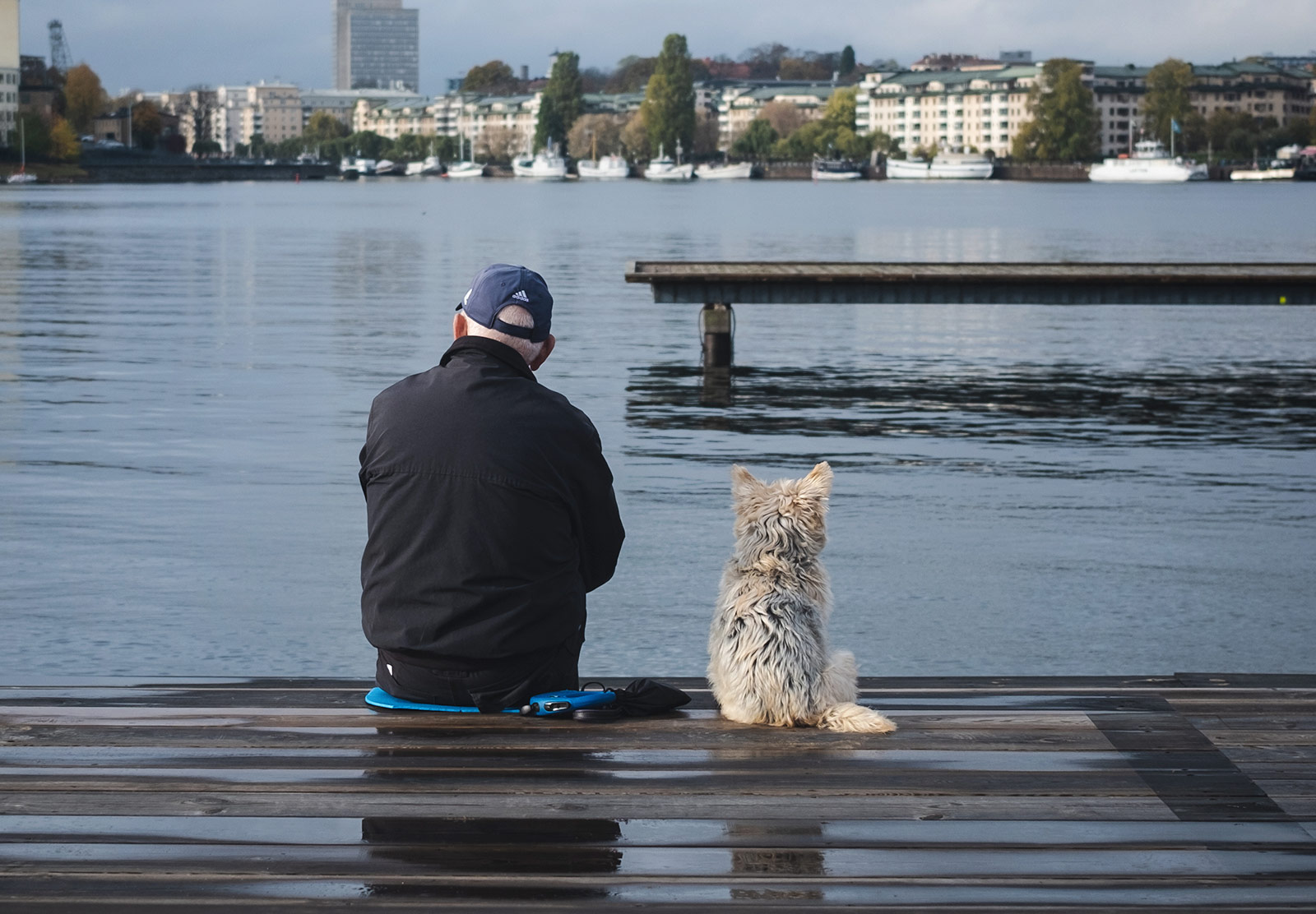 Man sitting with dog