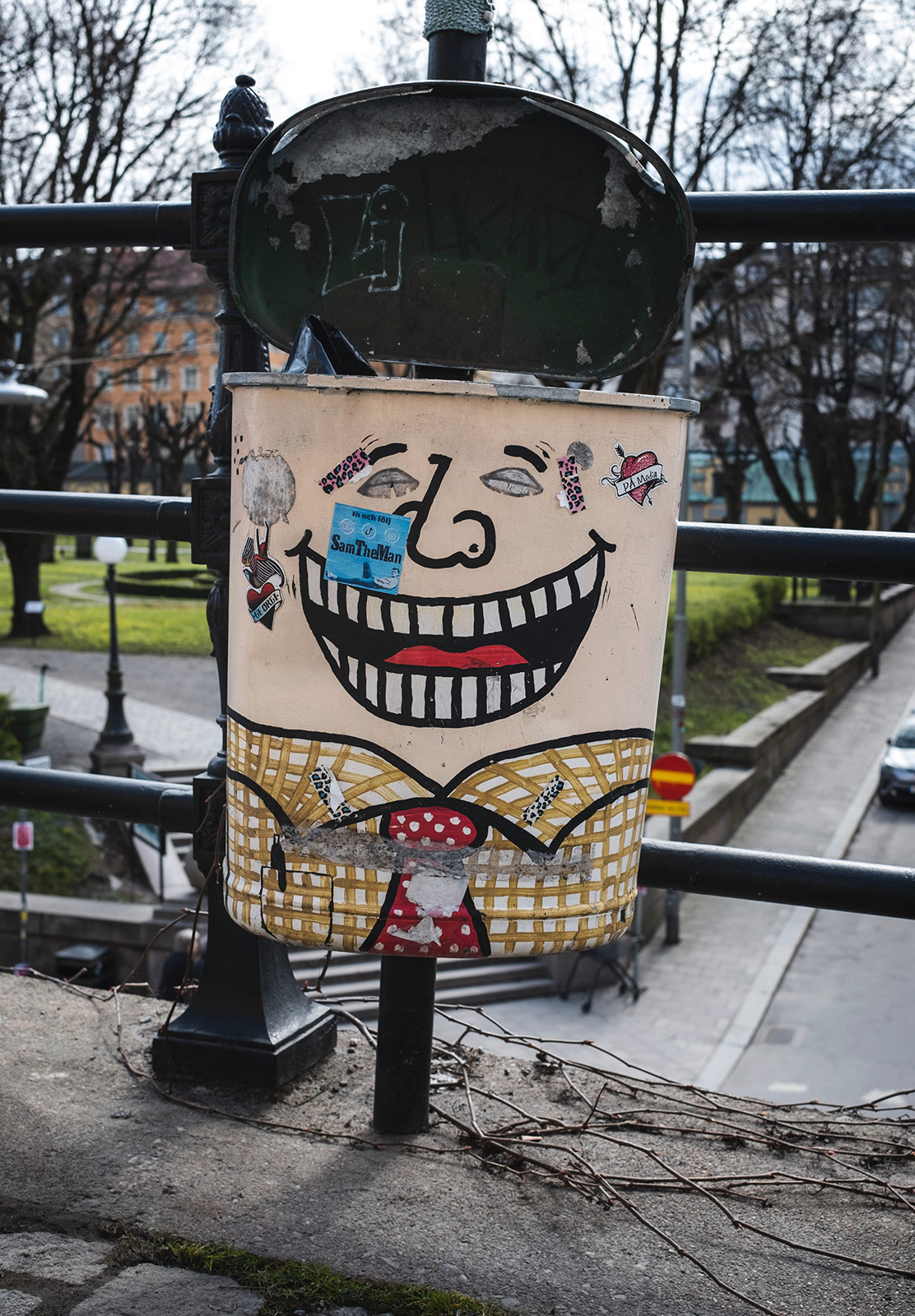 Face painted on bin