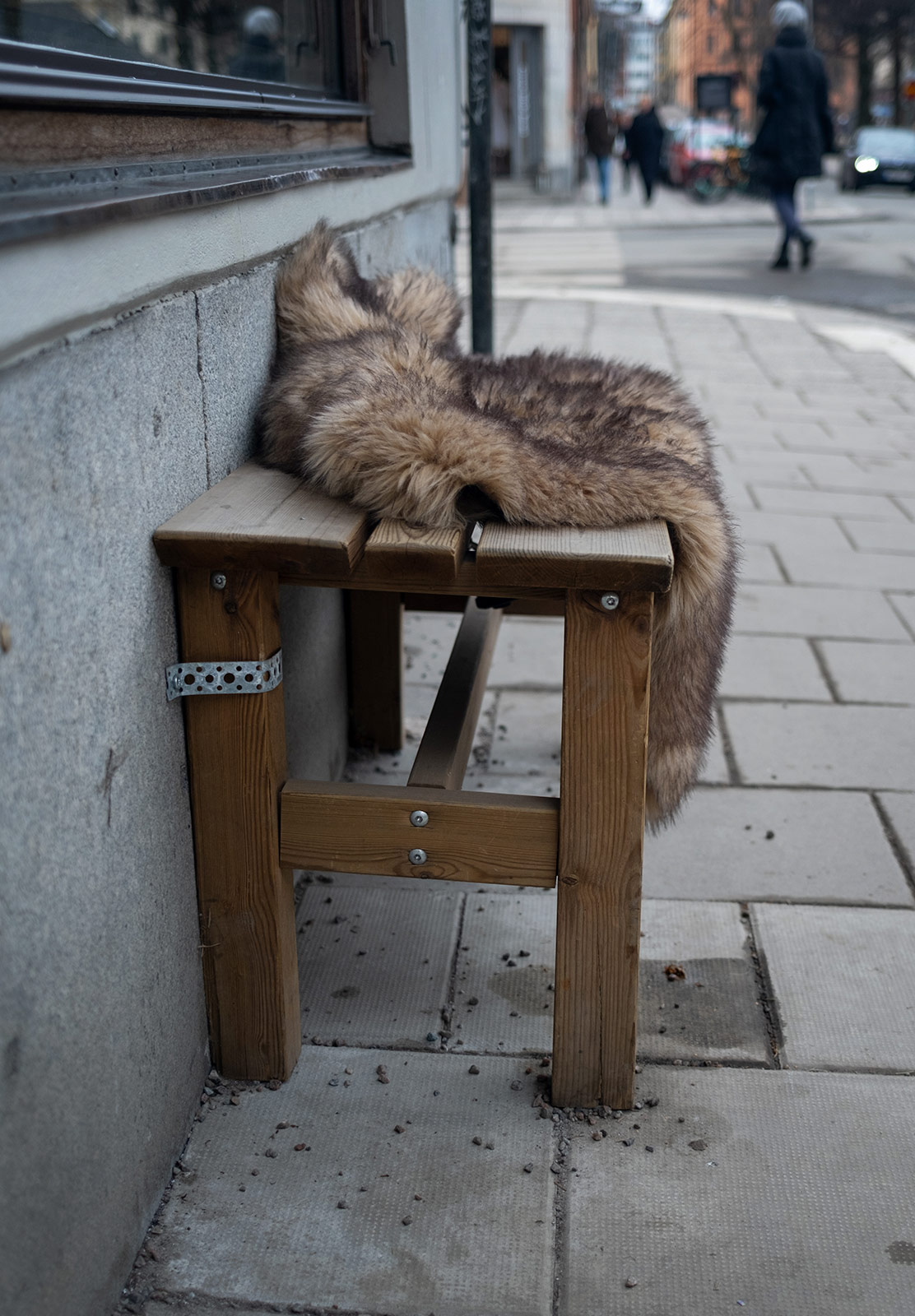 Animal fur on wooden bench