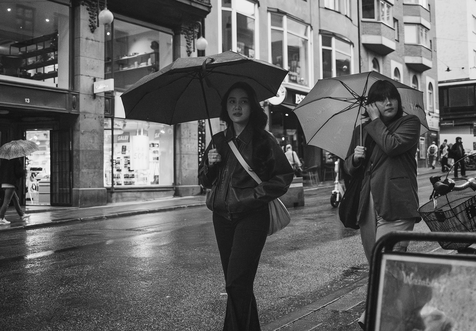 Women with umbrellas