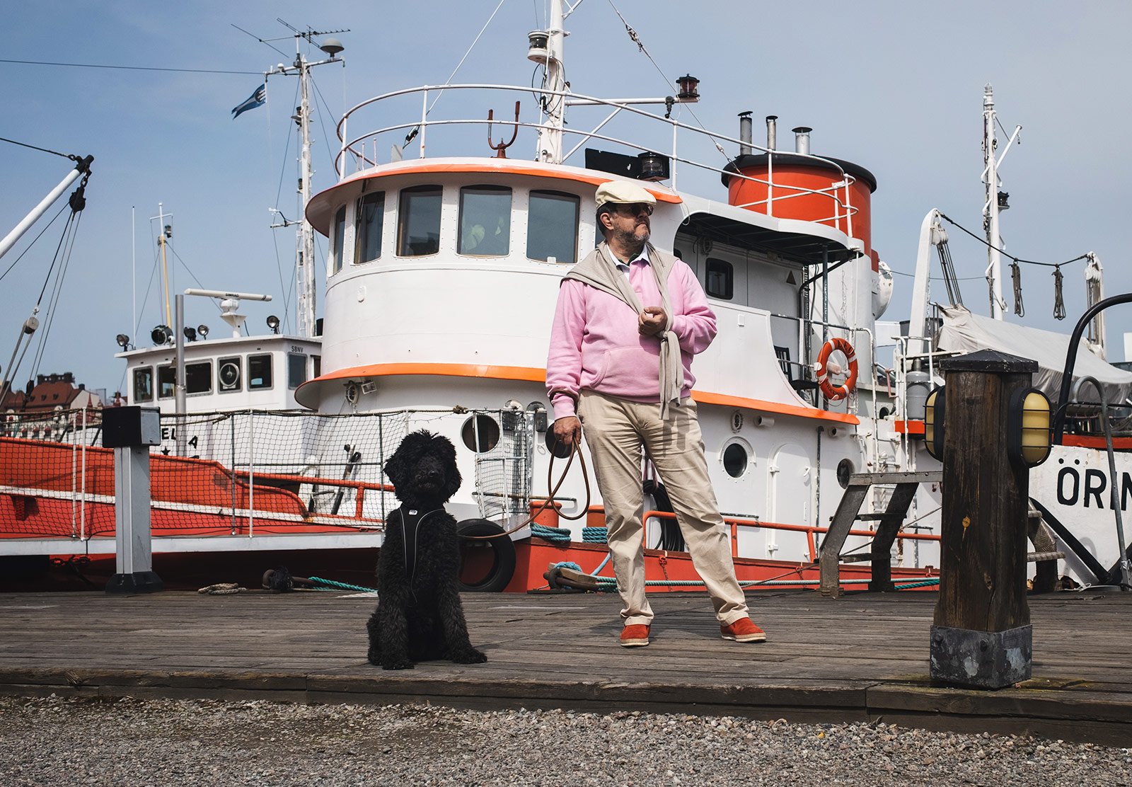 Man stood with dog