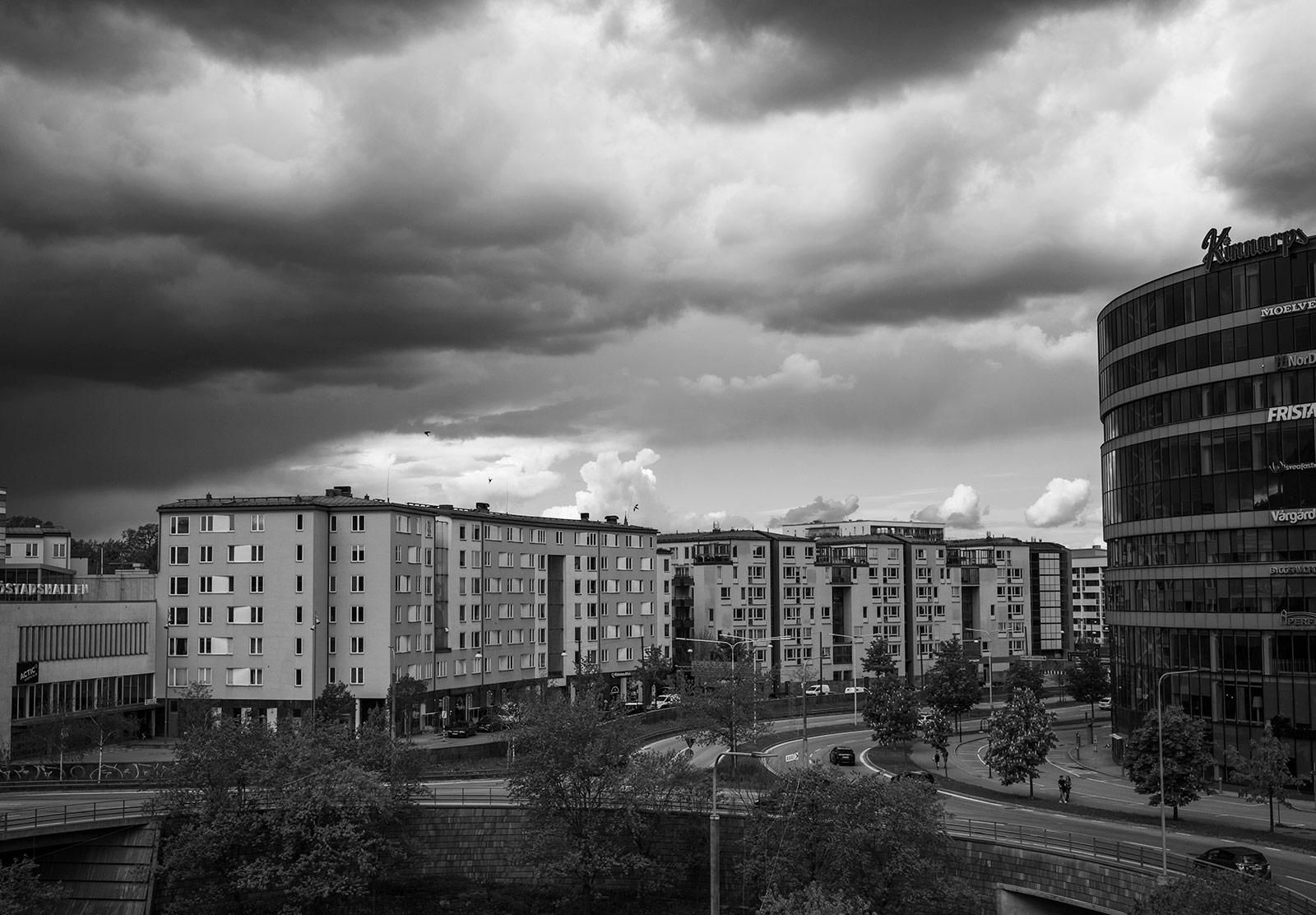 Dark cloud over buildings