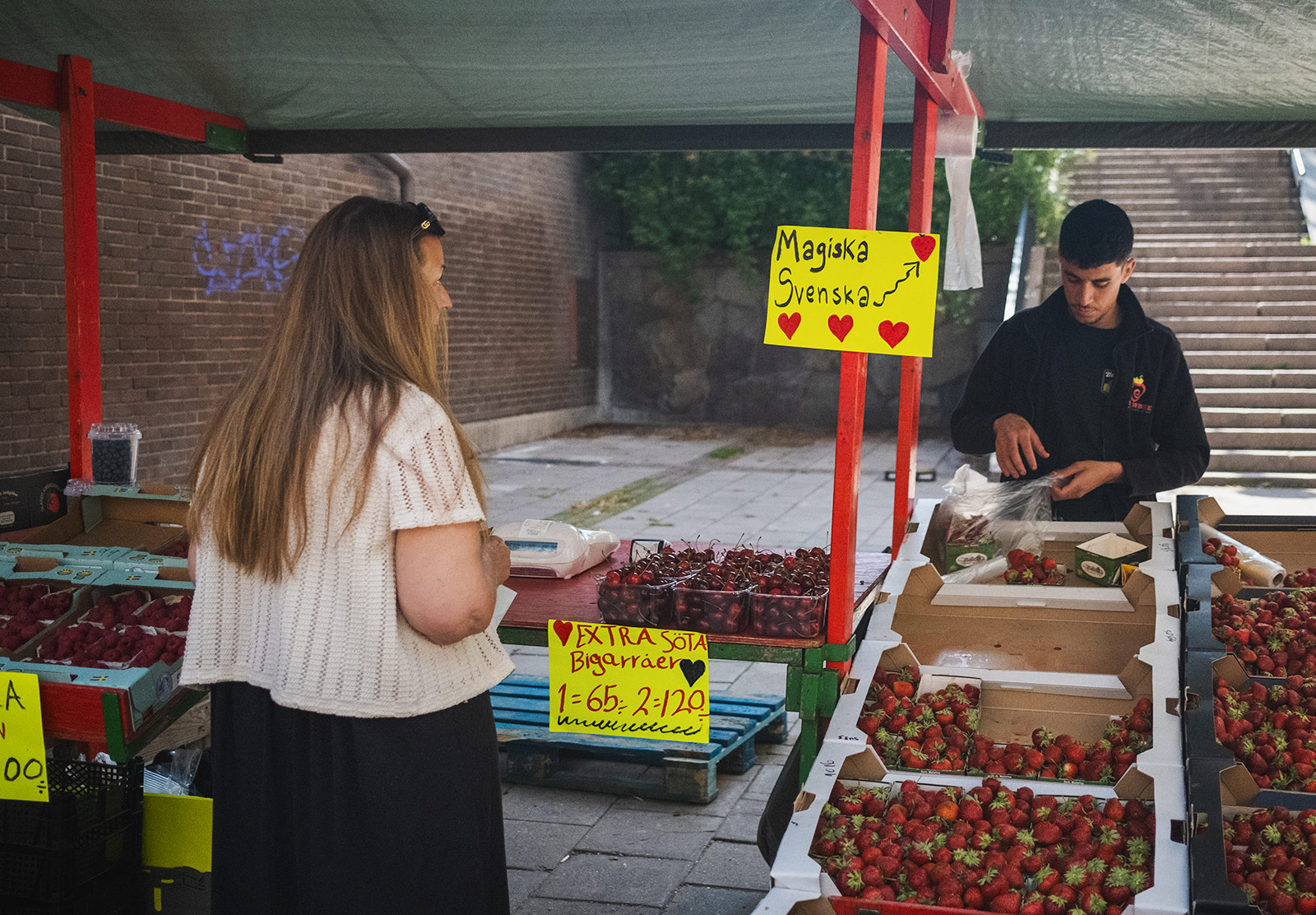 Strawberry seller with fruit