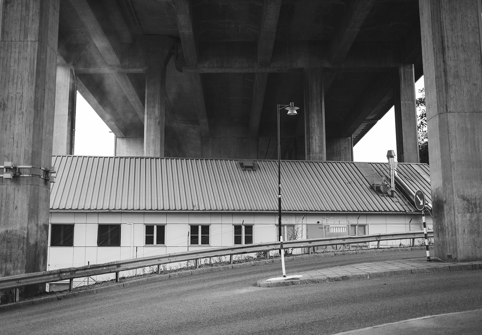 Building under bridge