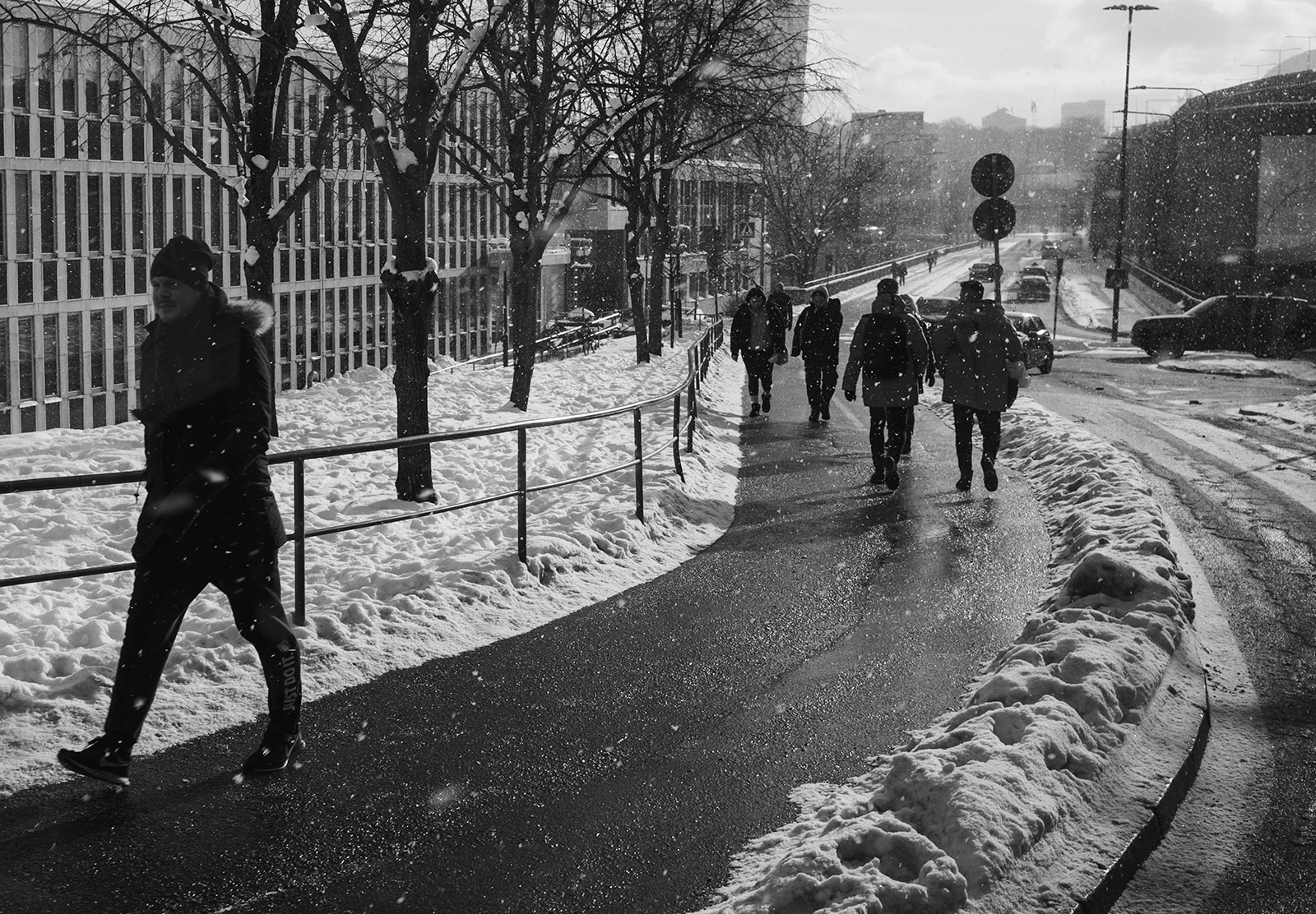 People walking in falling snow