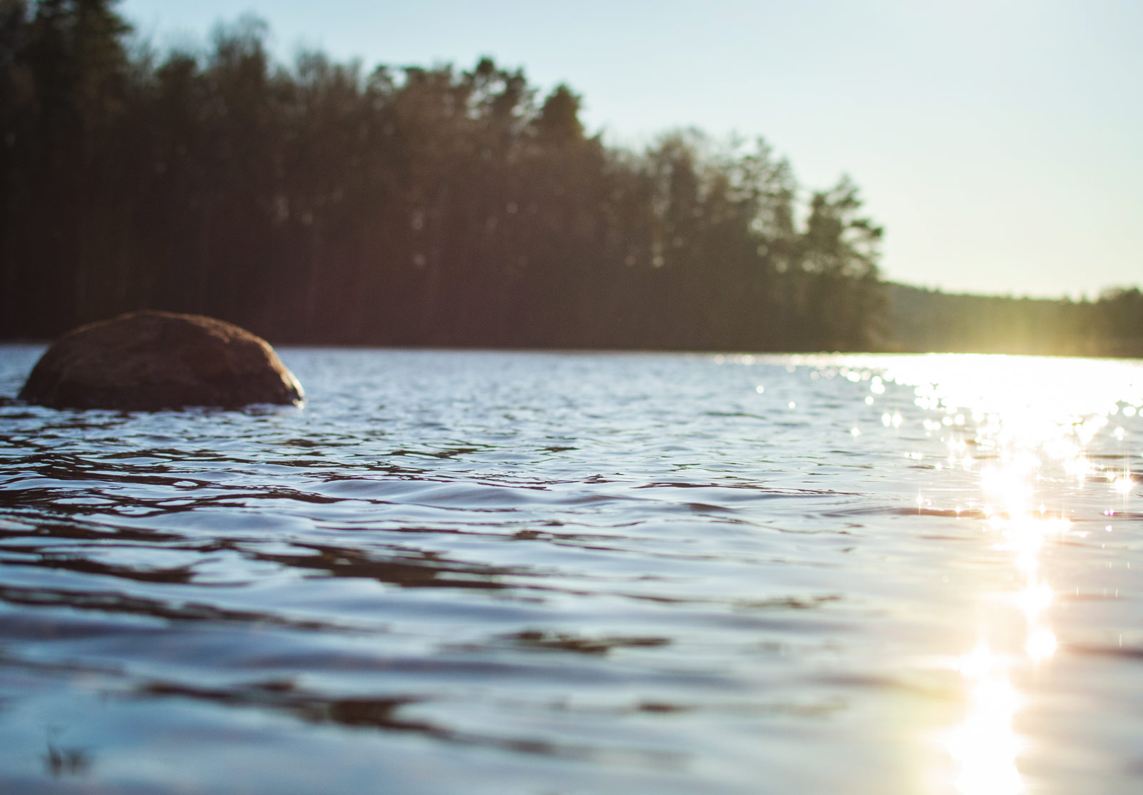 Sun shining on lake
