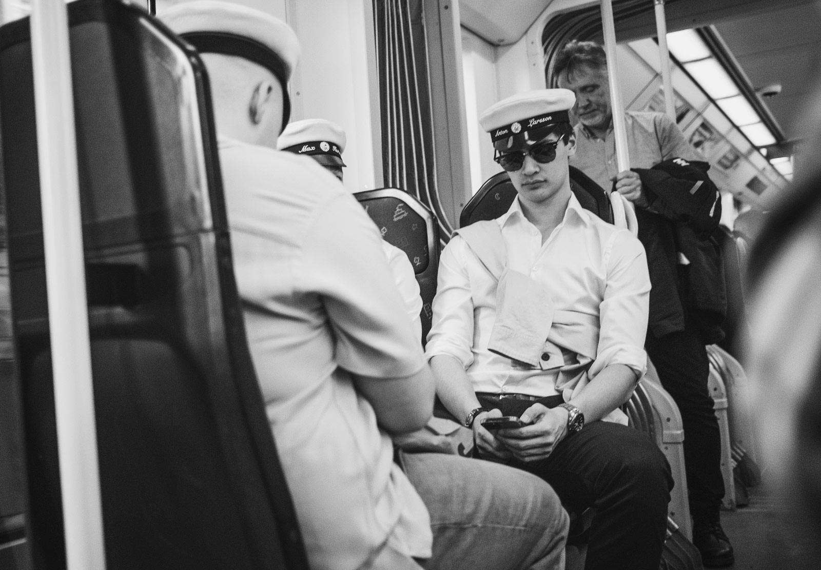 Man in white hat on the train