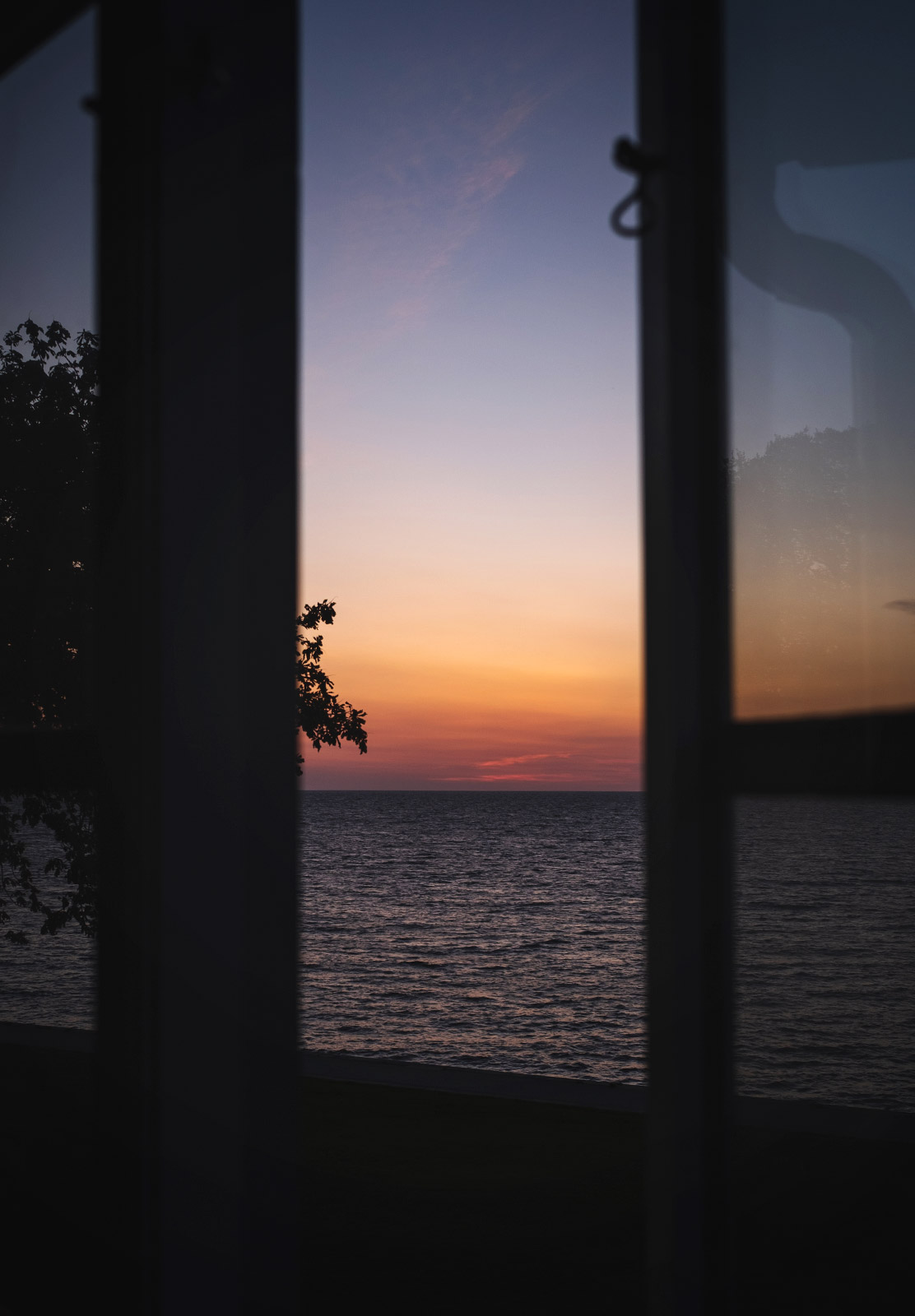 Sunset through open window
