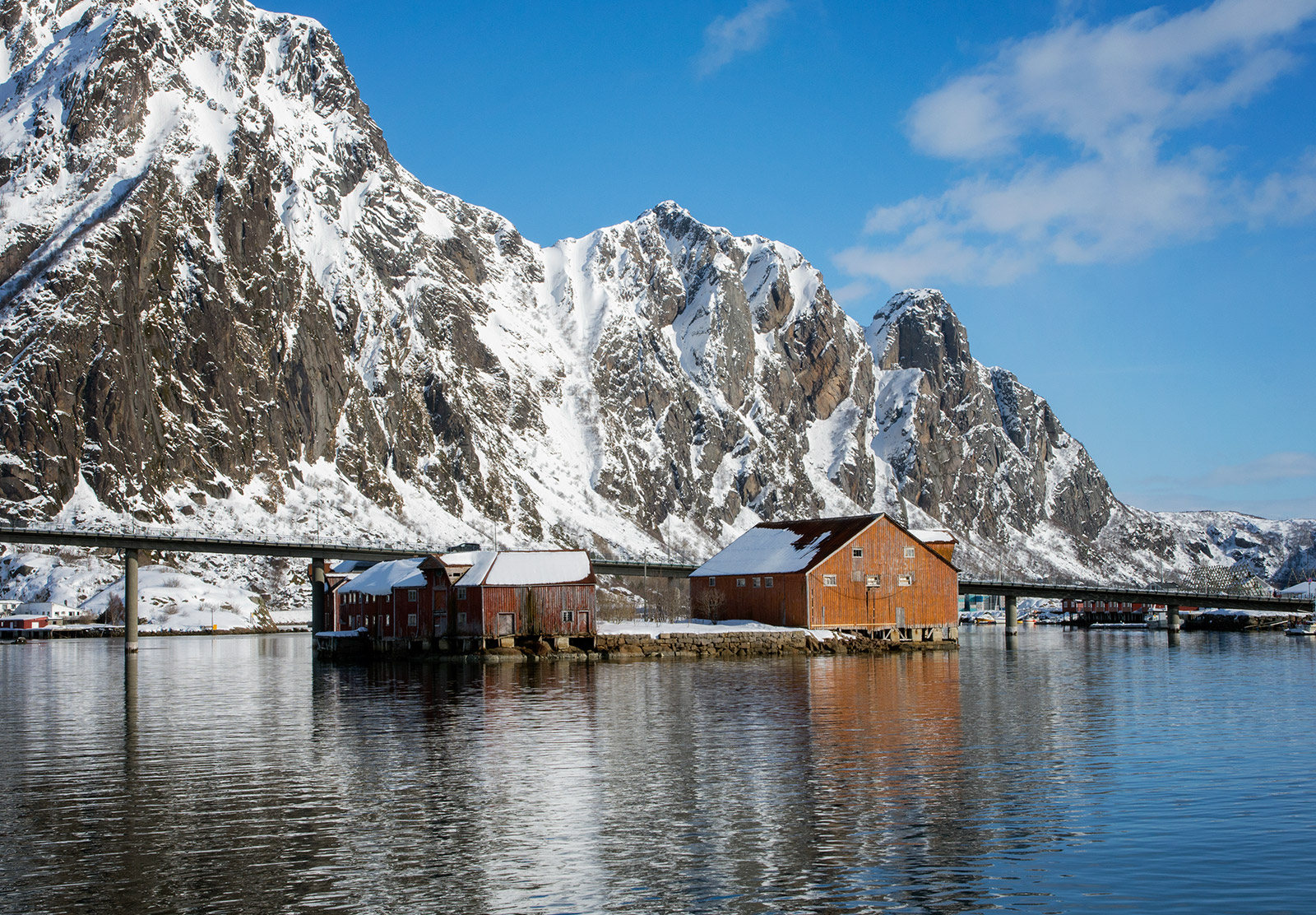 Wooden buildings on water