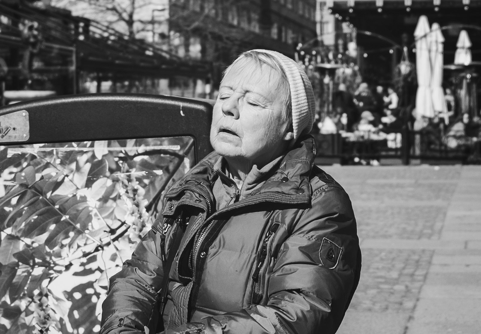Lady with eyes closed and sun on her face