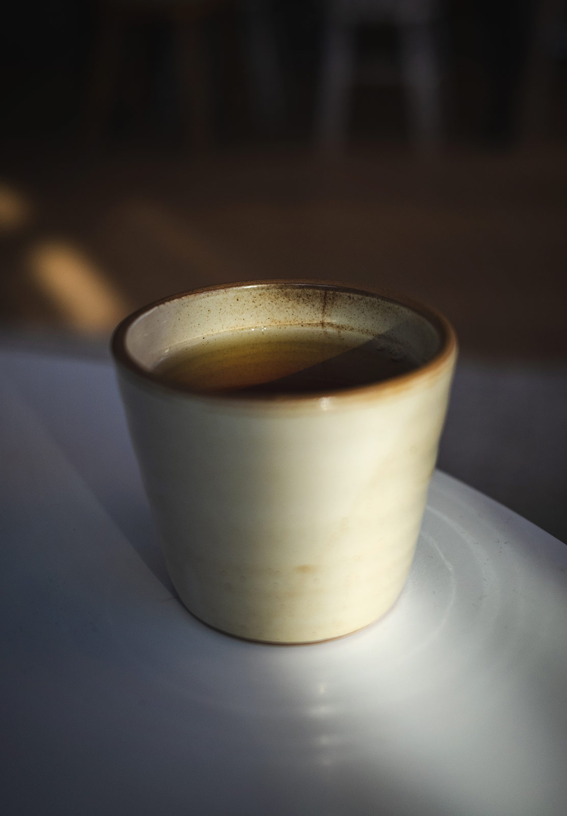 Sun shining on tea cup