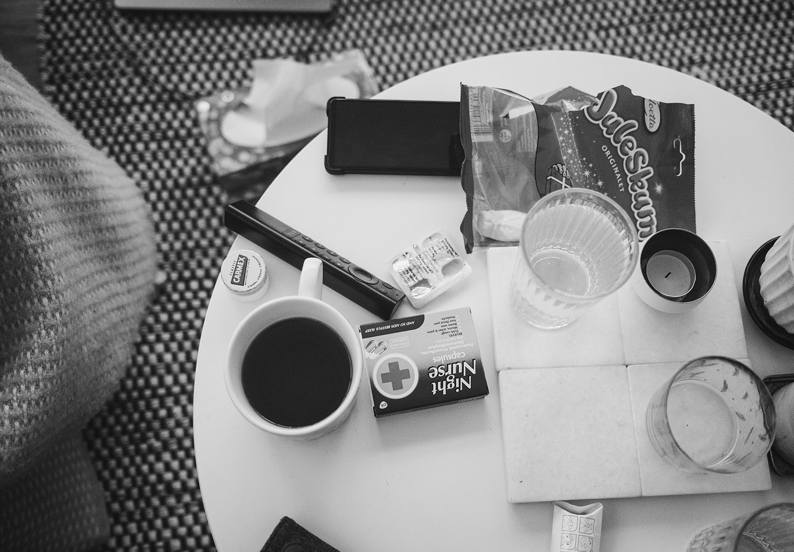 Tea and medicine on coffee table
