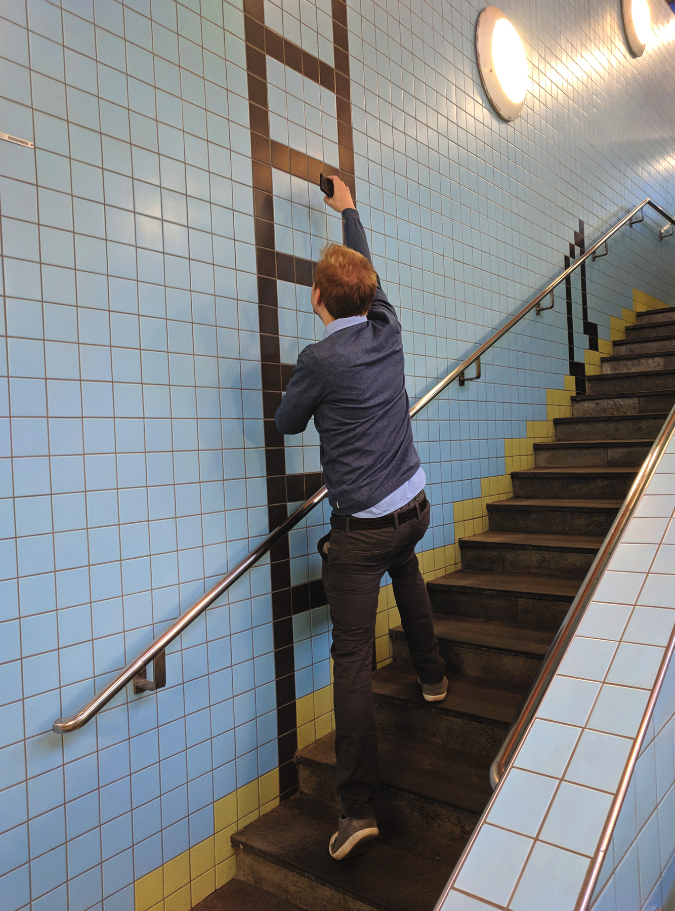 Man climbling tile ladder