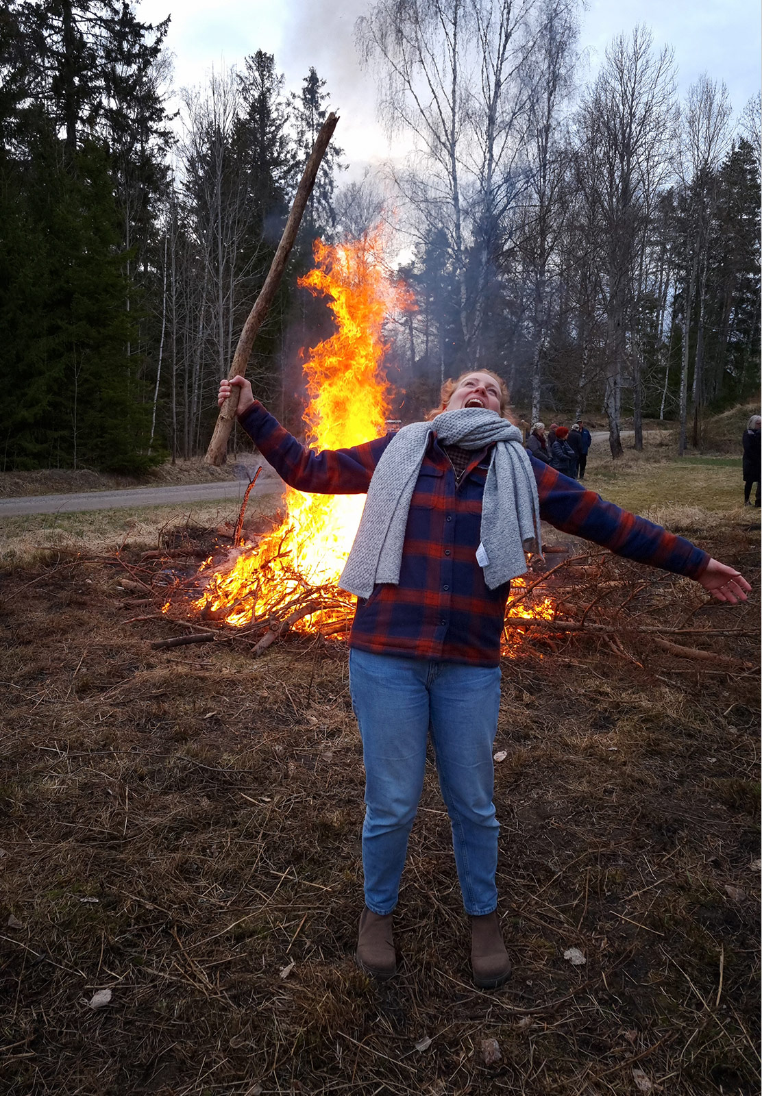 Woman with log in her hand