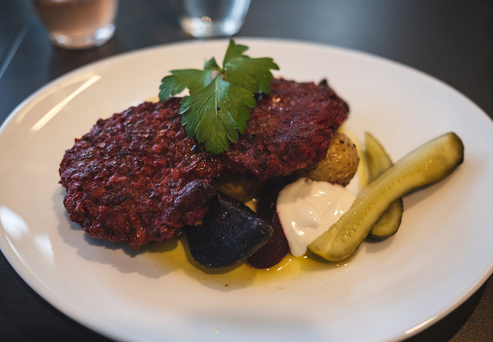 Meat and potatoes with pickles