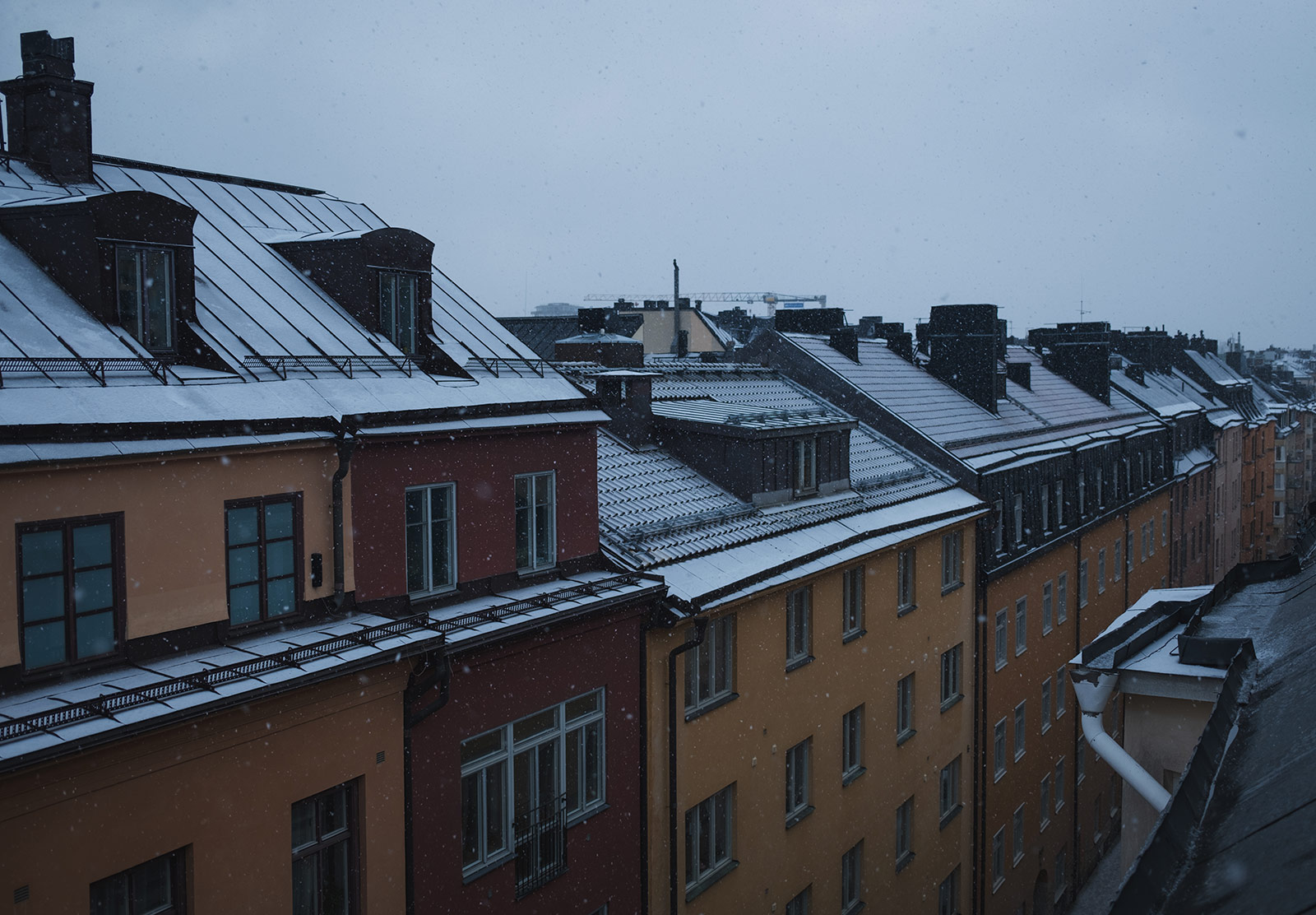 Old buildings with snow on the roof