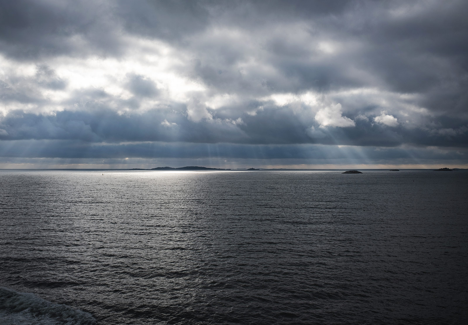 Light rays shining on sea