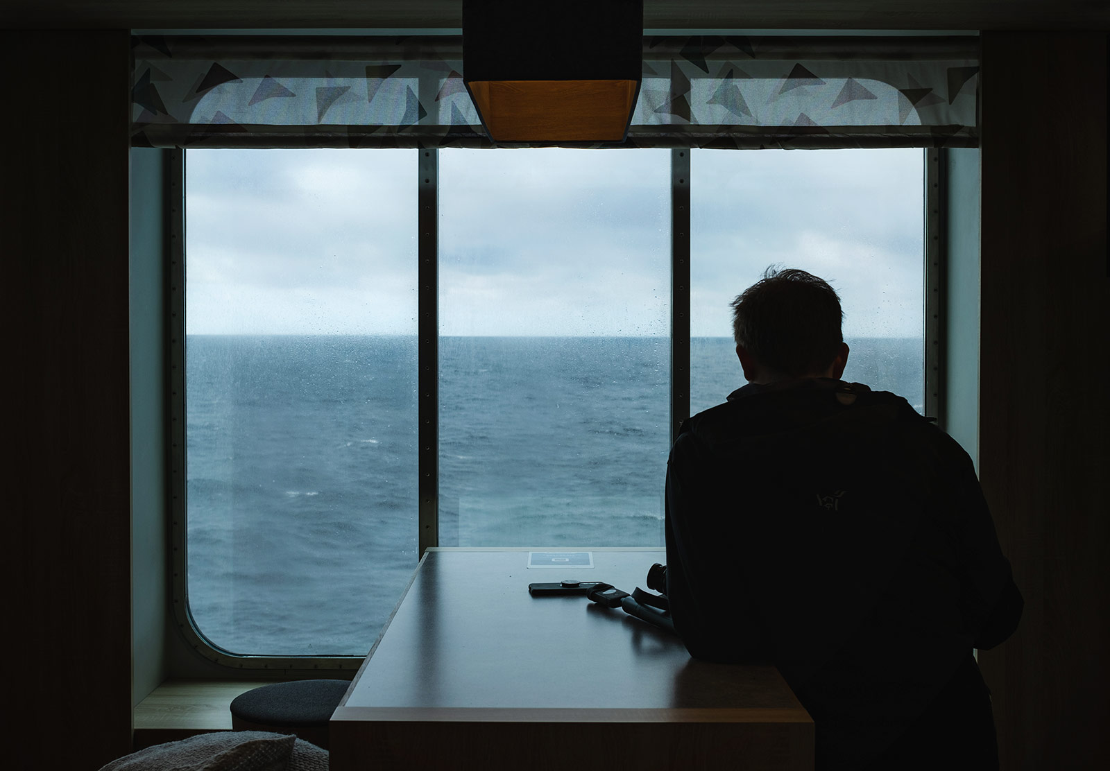 Man sitting in window