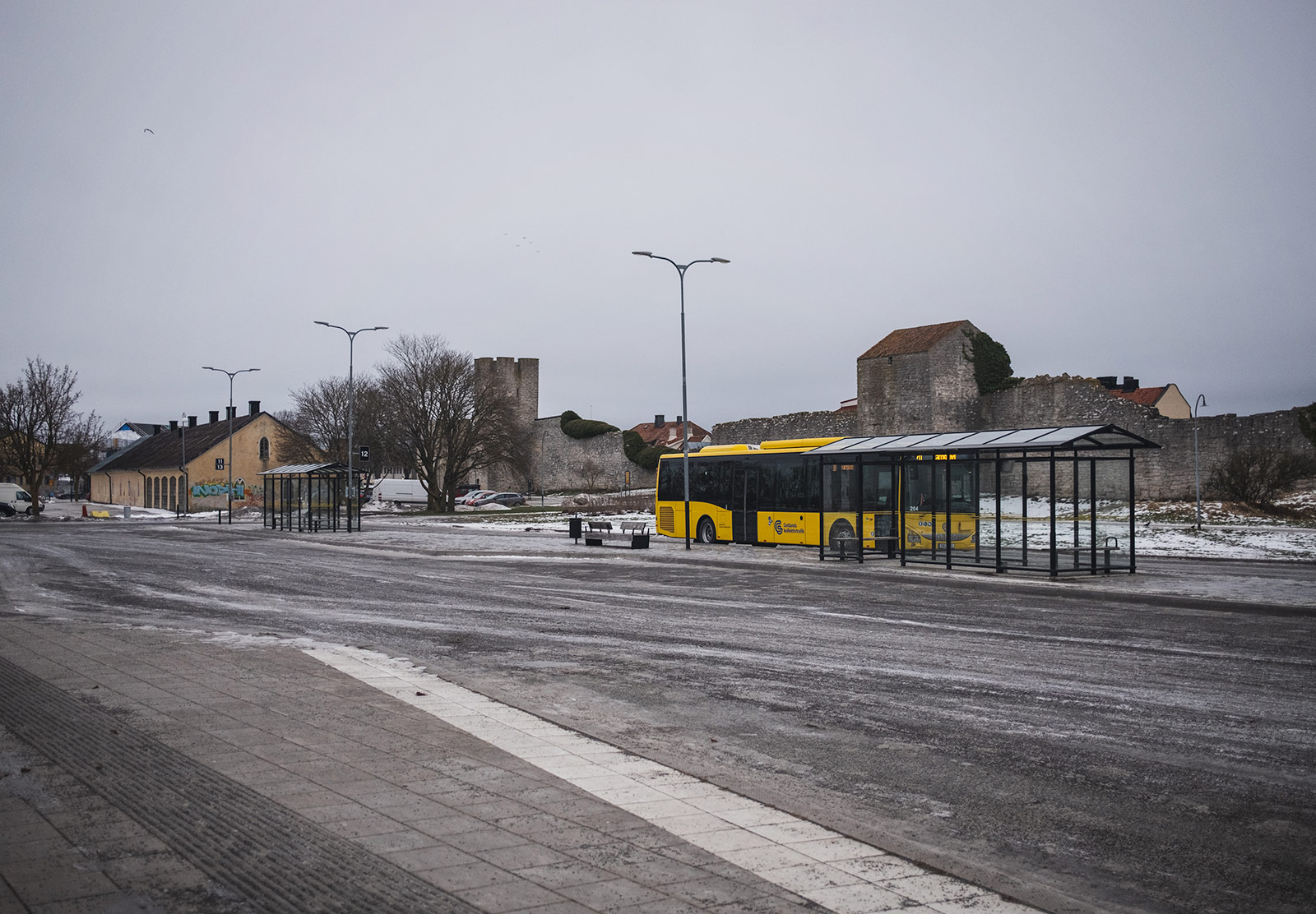 Bus parked next to bus stop