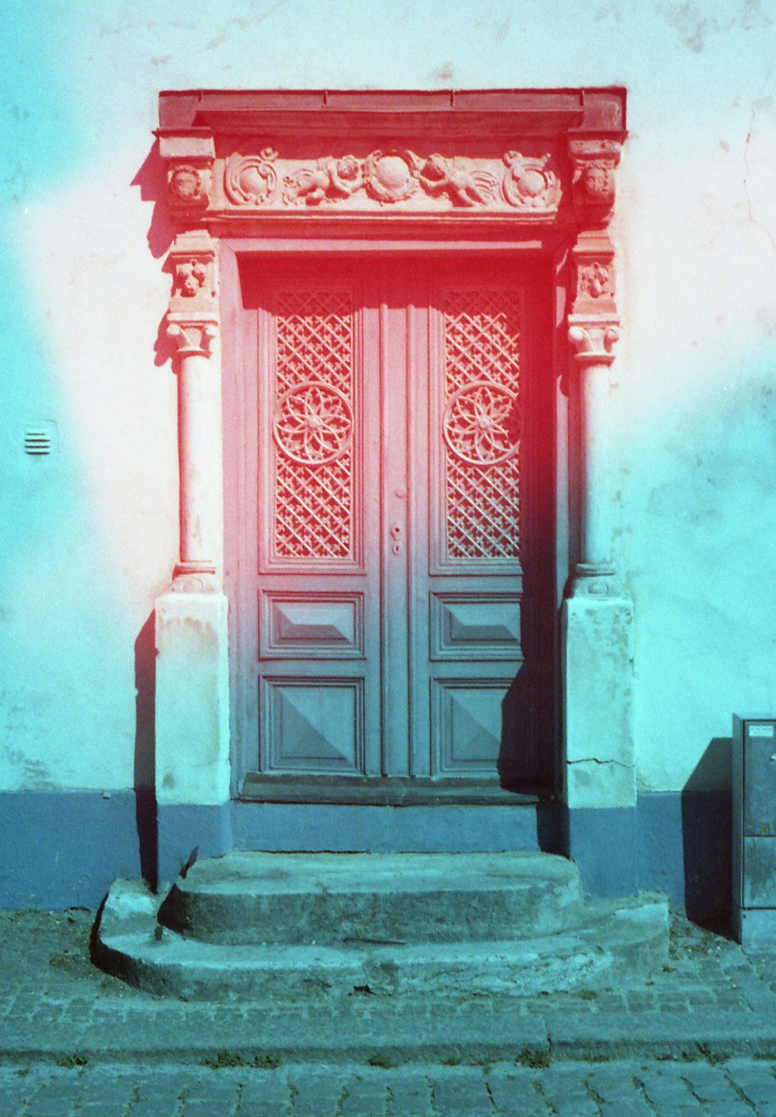 Old wooden door with iron work