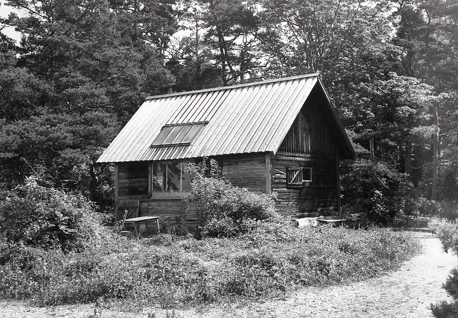 Wooden house in the sand