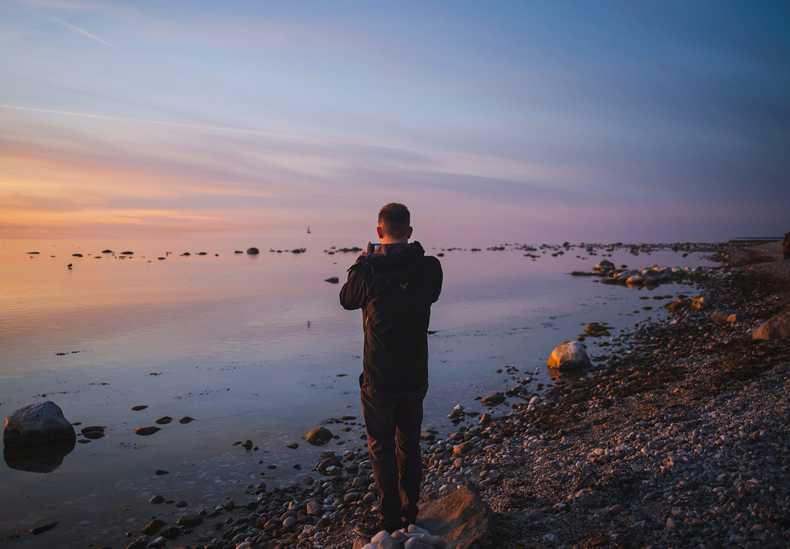 Man looking at the sunset
