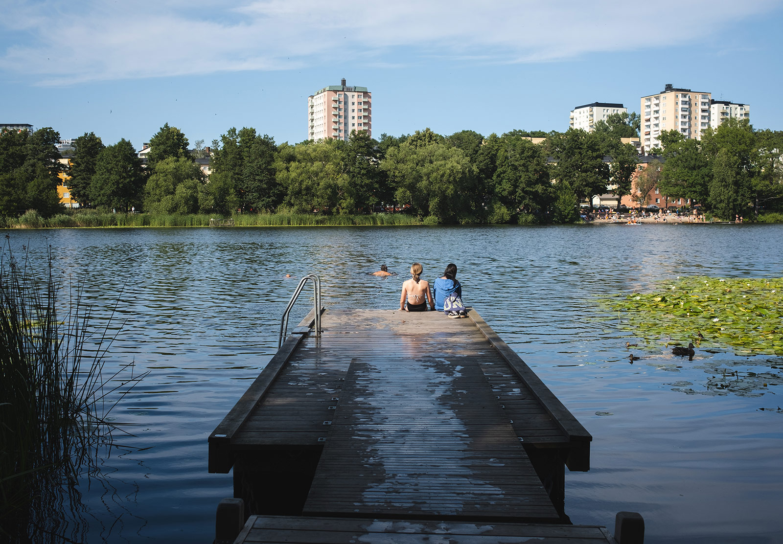 People sat on jetty